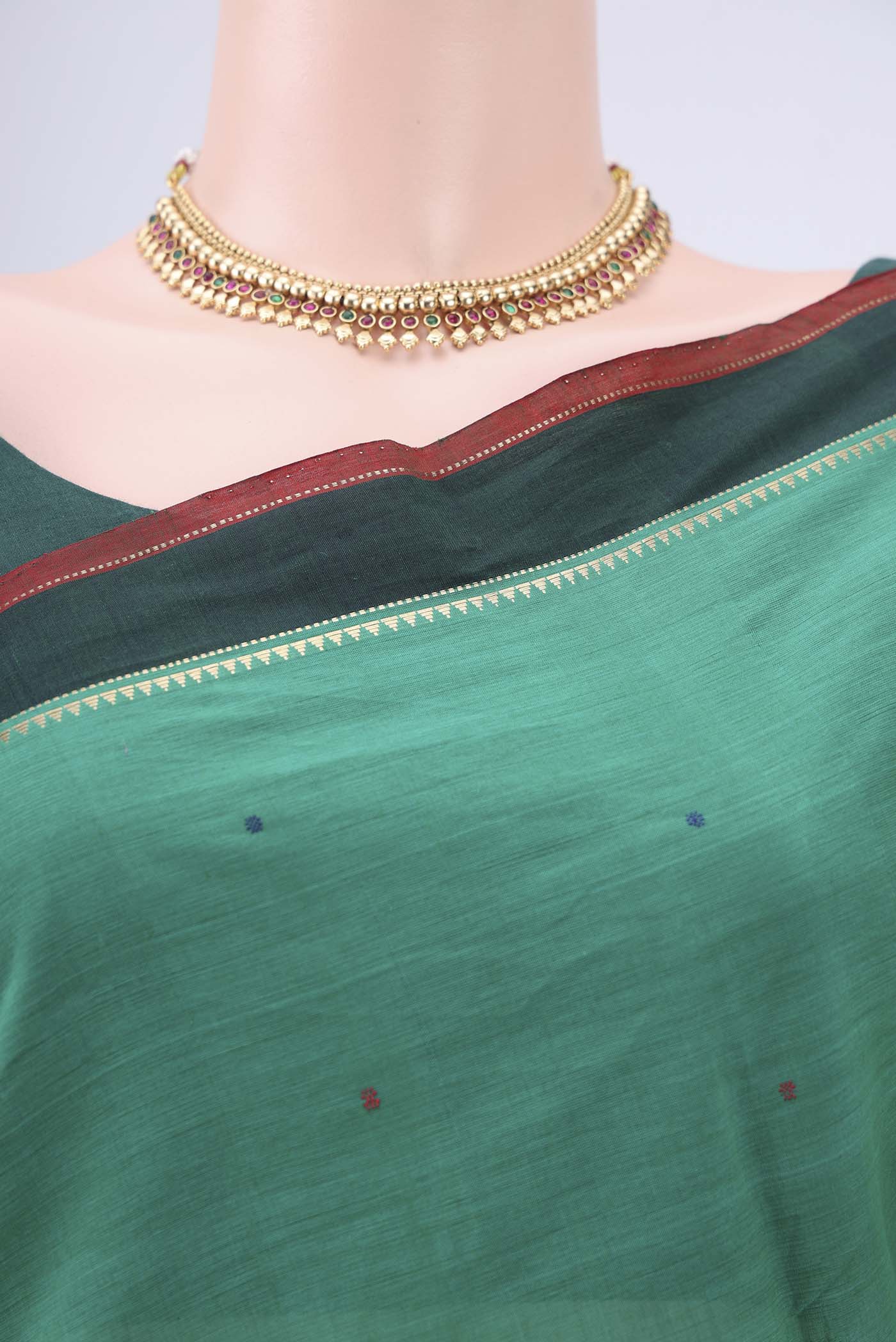 Border image of Bottle Green Kanchi Cotton Saree with Thread Butta on the body and Zari Border. 