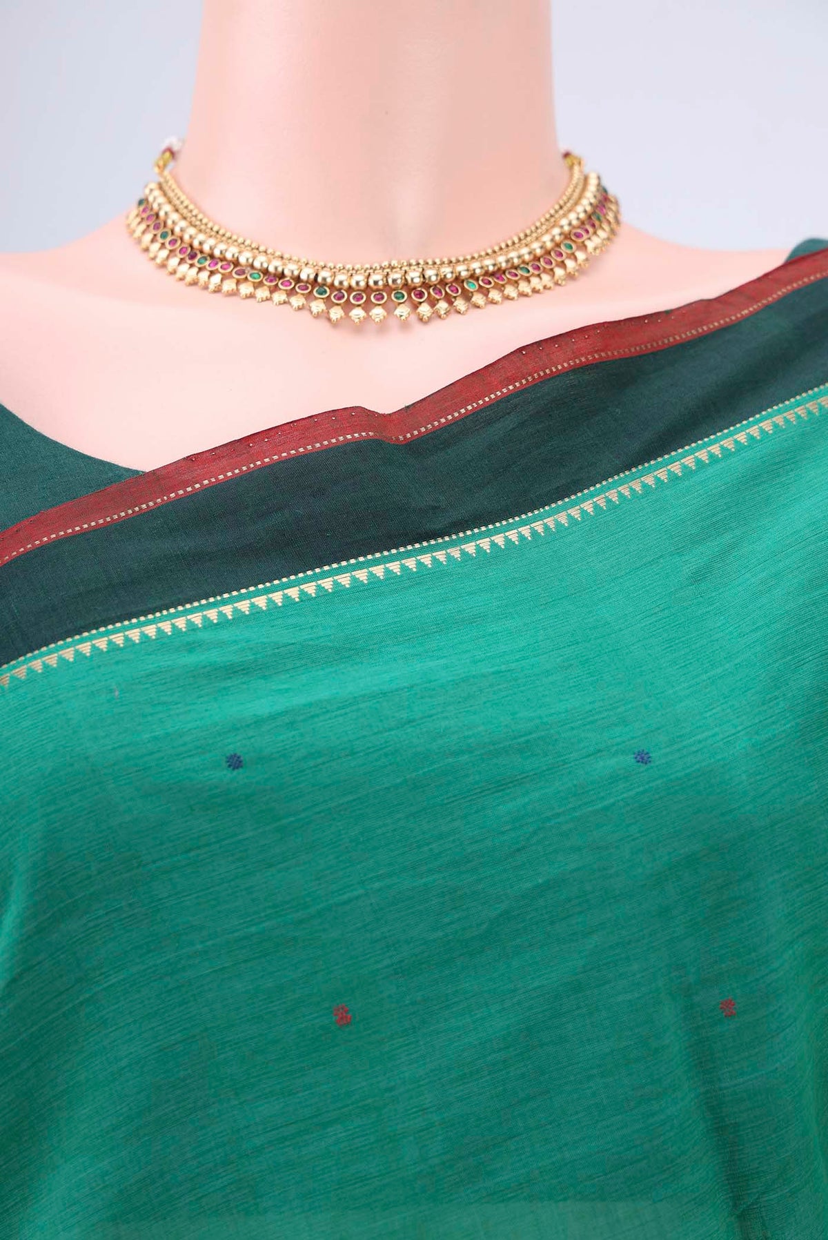 Border image of Bottle Green Kanchi Cotton Saree with Thread Butta on the body and Zari Border. 
