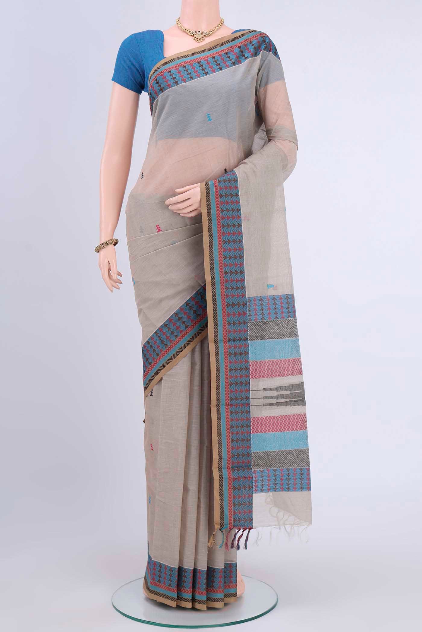 Grey Kanchi Cotton Saree with Thread Butta on the body and Plain Border displayed on a mannequin