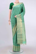 Pista Green Dual Tone Kanchipuram Silk Saree with Jacquard design on the body and Zari Border displayed on a mannequin