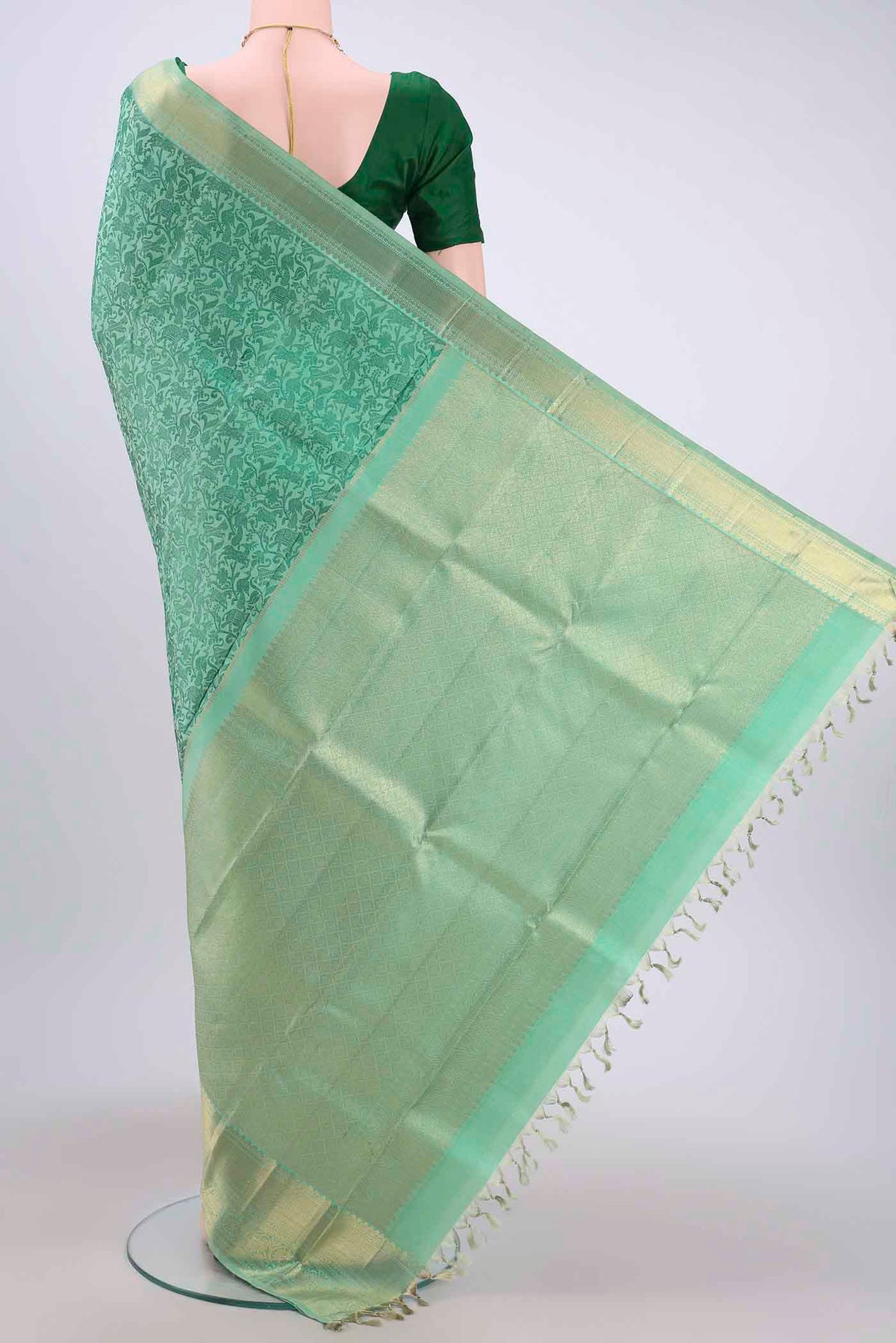 Flat view of Pista Green Dual Tone Kanchipuram Silk Saree with Jacquard design on the body and Zari Border