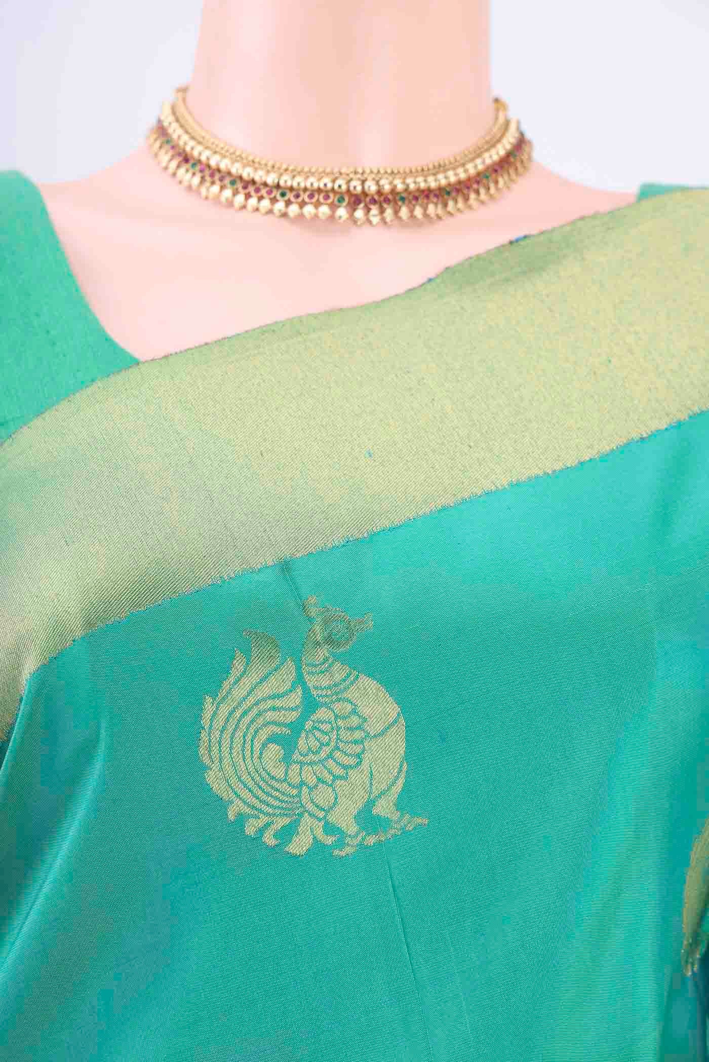 Border image of Sea Green Kanchipuram Silk Saree with Zari Butta on the body and Zari Border