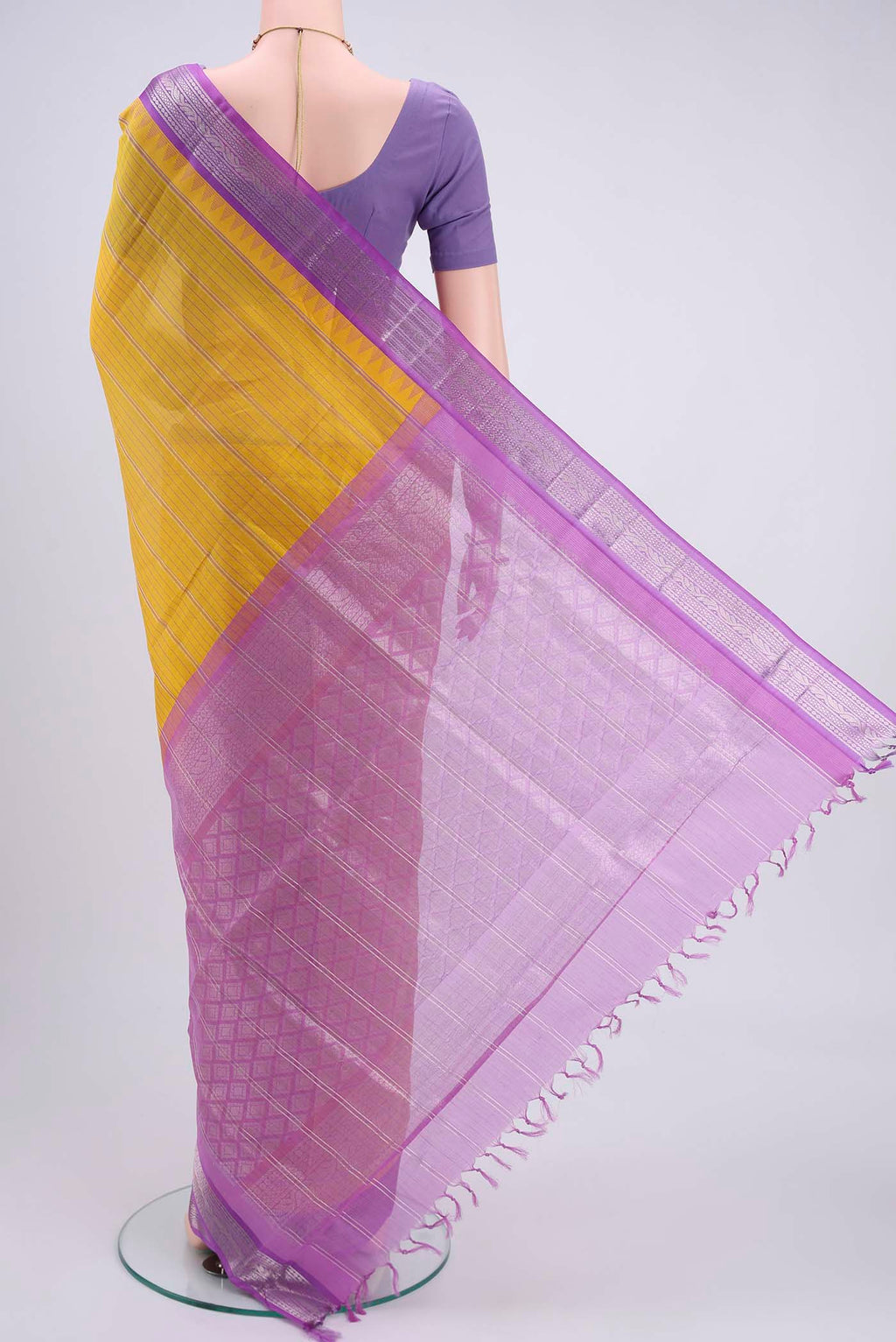 Flat view of Lemon Yellow Blended Coimbatore Silk Cotton Saree with Stripes on the body and Zari Border. 