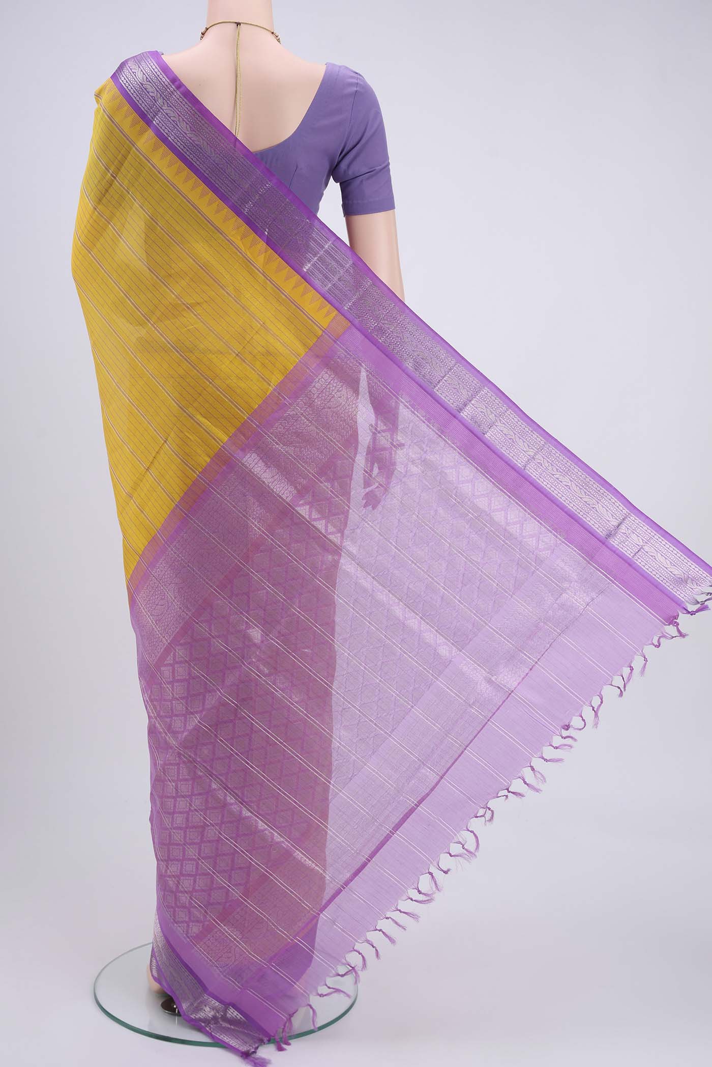 Flat view of Lemon Yellow Blended Coimbatore Silk Cotton Saree with Stripes on the body and Zari Border. 