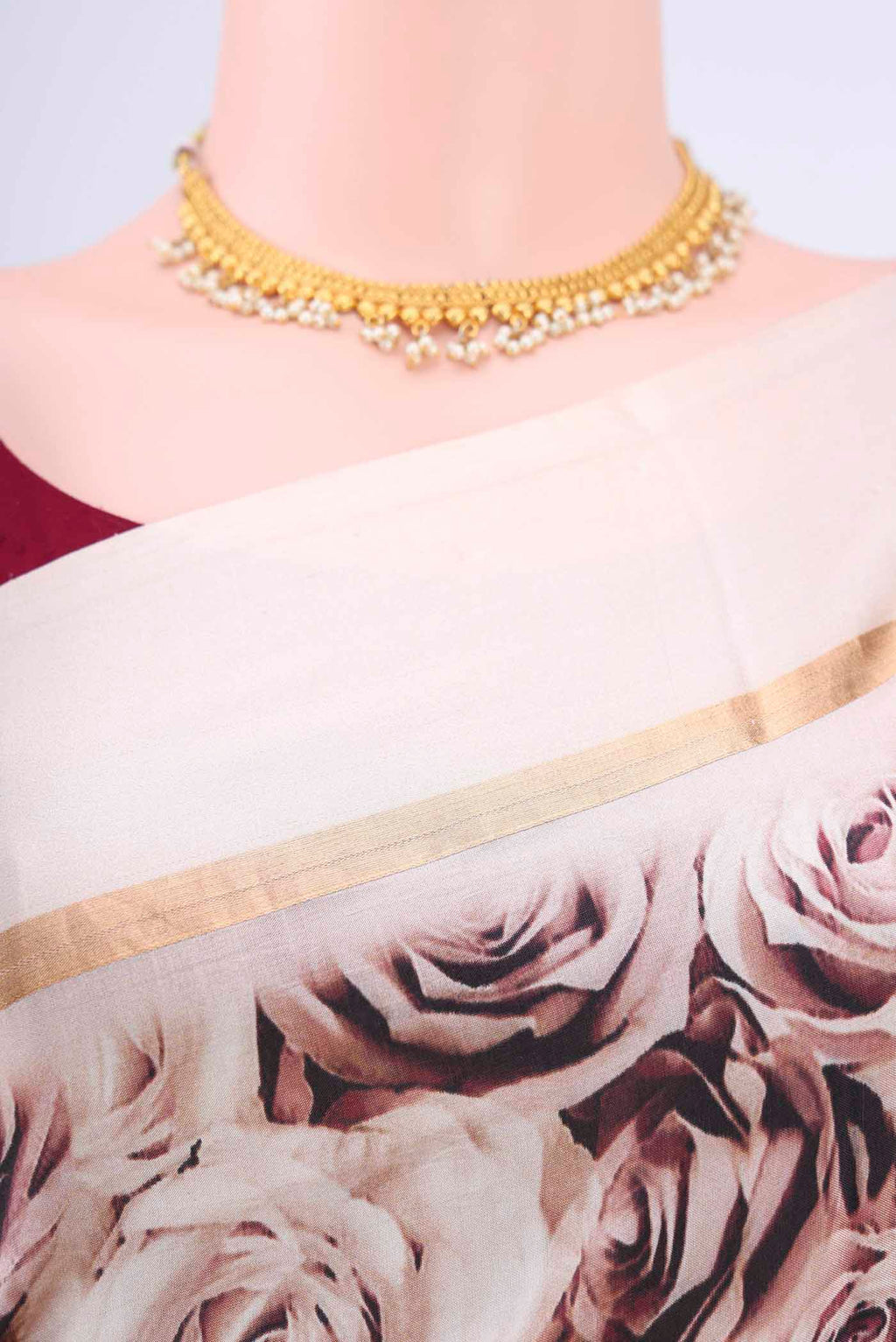 Border image of Rose Gold Printed Silk Saree with Printed design on the body and Zari Border