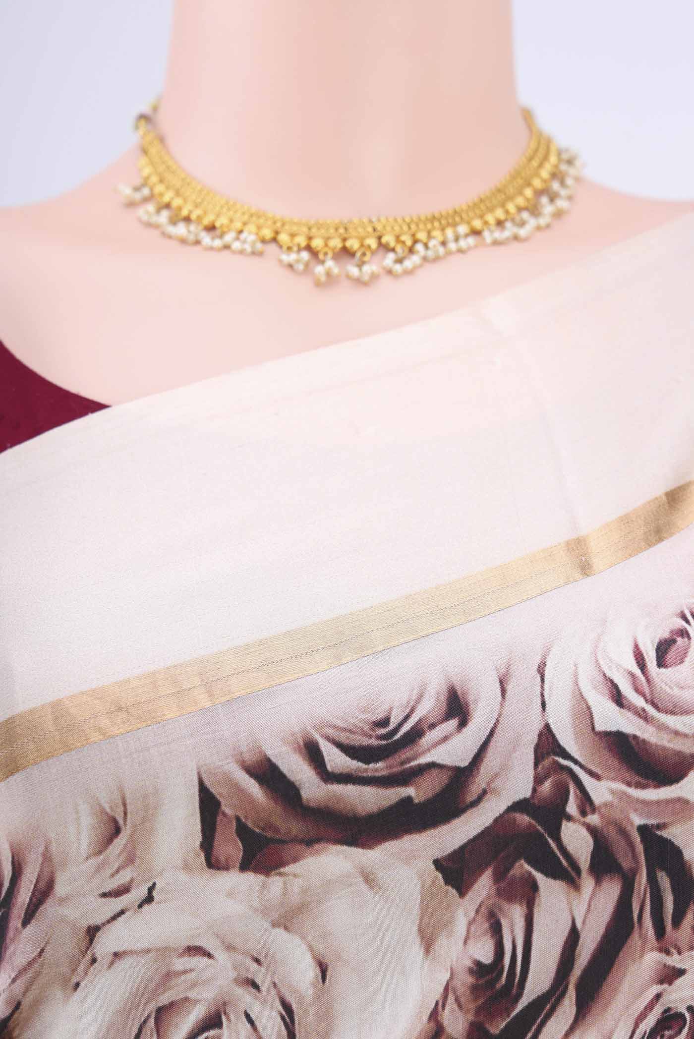 Border image of Rose Gold Printed Silk Saree with Printed design on the body and Zari Border