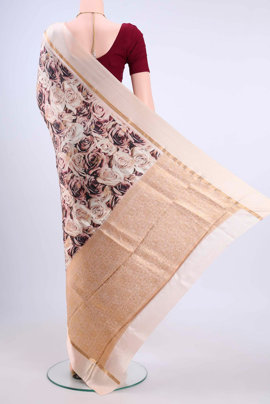 Flat view of Rose Gold Printed Silk Saree with Printed design on the body and Zari Border