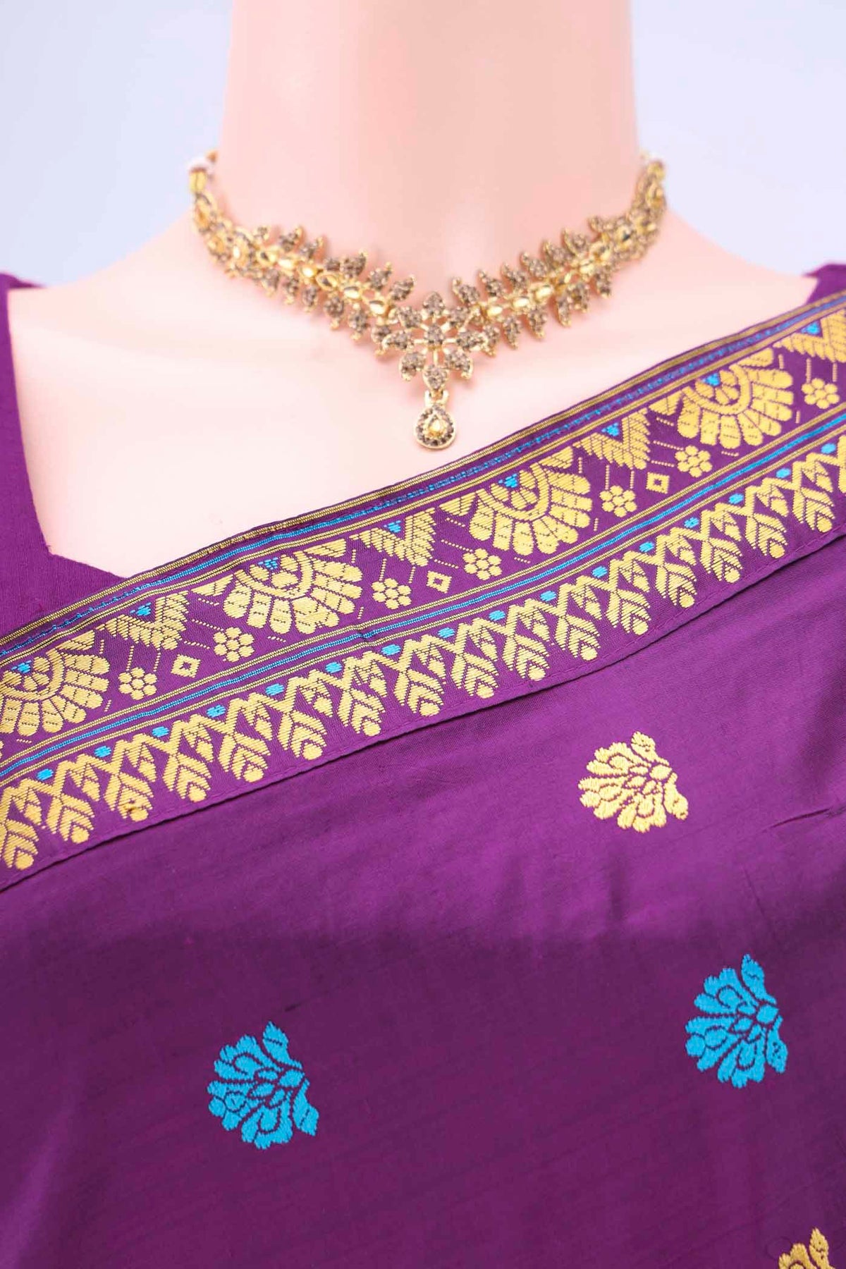 Border image of Burgundy Dual Tone Assam Silk Saree with Zari Butta on the body and Zari Border