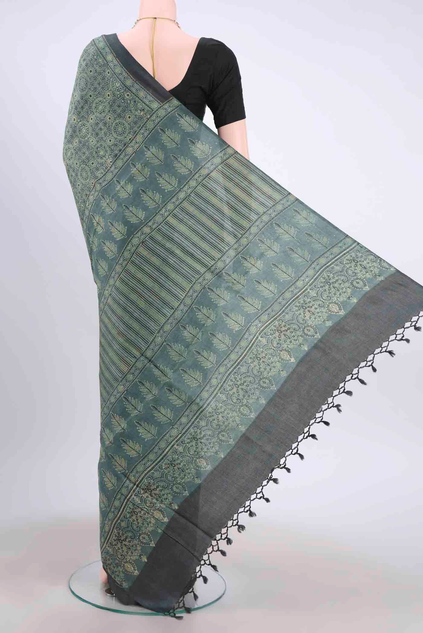Flat view of Light Green Tussar Silk Saree with Ajrakh Print on the body and Printed Border