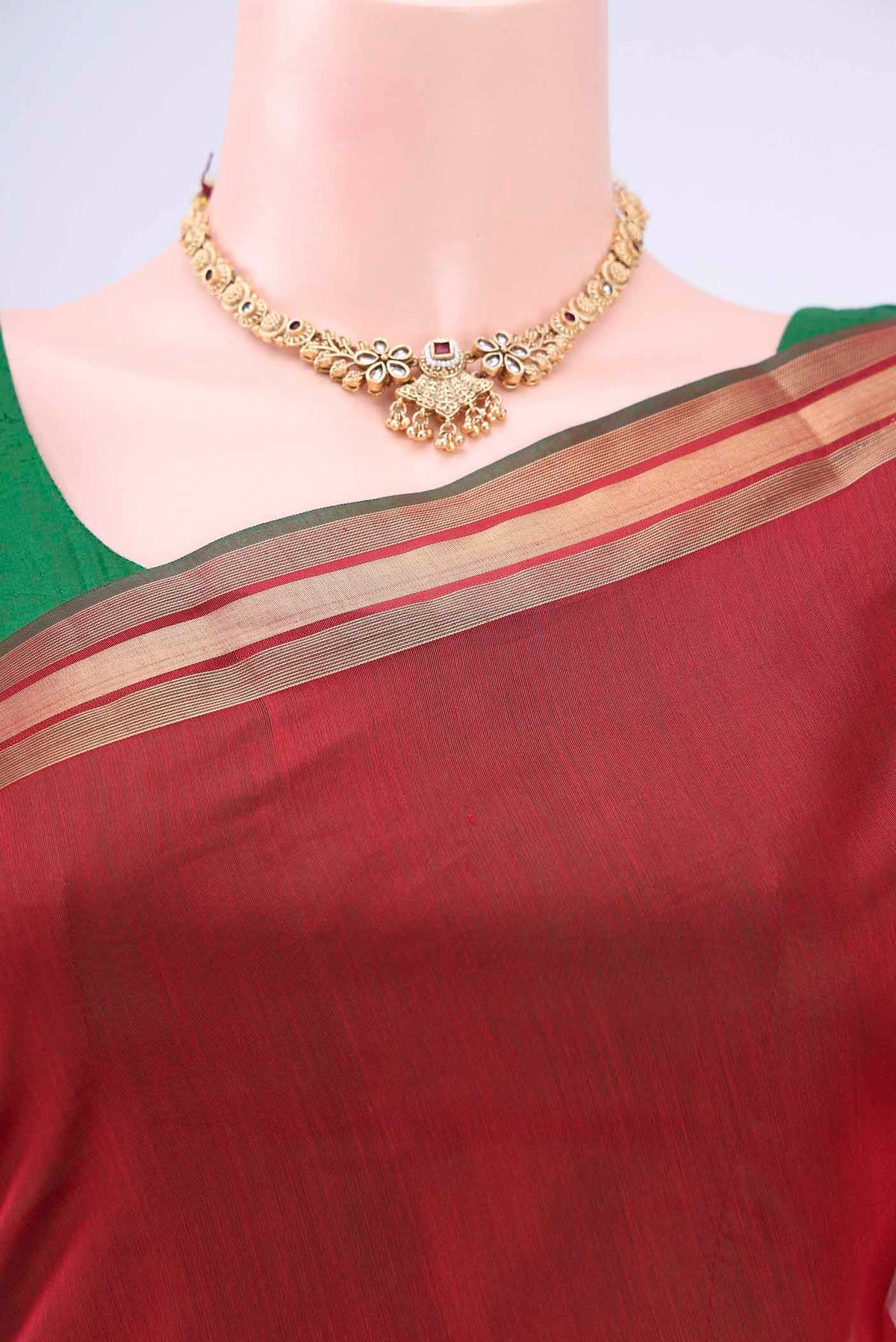 Border image of Red Kora Cotton Saree with Zari Butta on the body and Zari Border