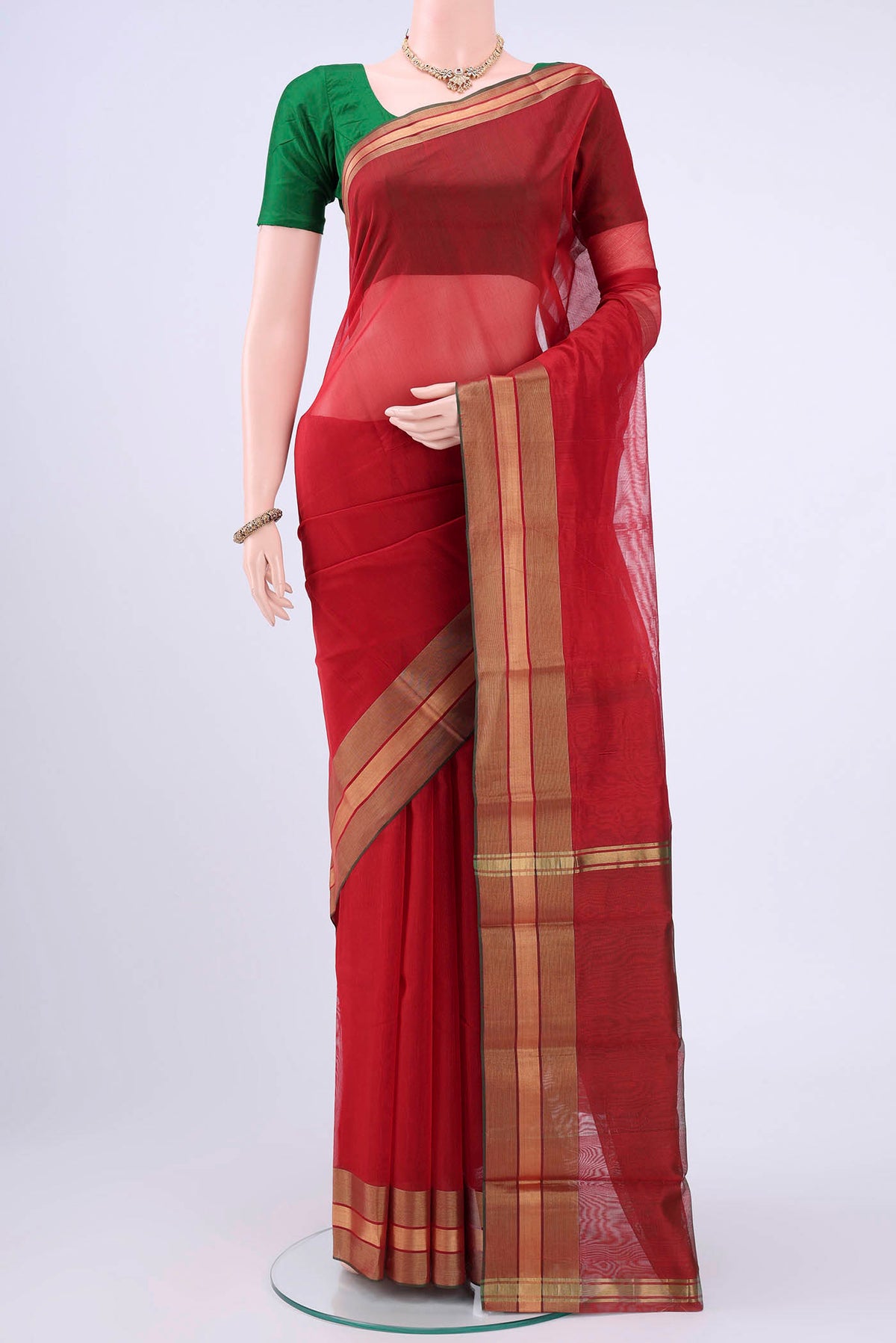 Red Kora Cotton Saree with Zari Butta on the body and Zari Border displayed on a mannequin
