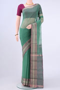 Sage Green Kora Cotton Saree with Zari Butta on the body and Zari Border displayed on a mannequin