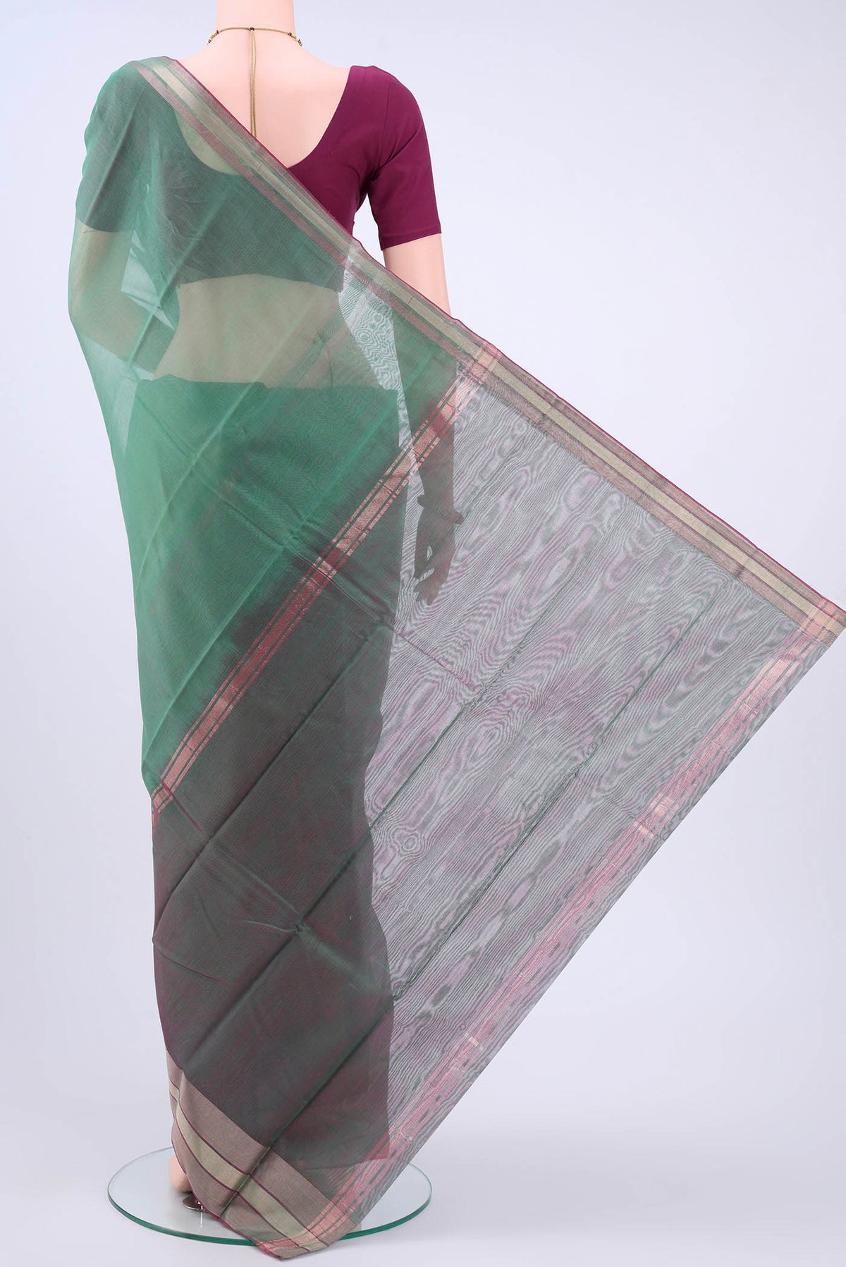 Flat view of Sage Green Kora Cotton Saree with Zari Butta on the body and Zari Border