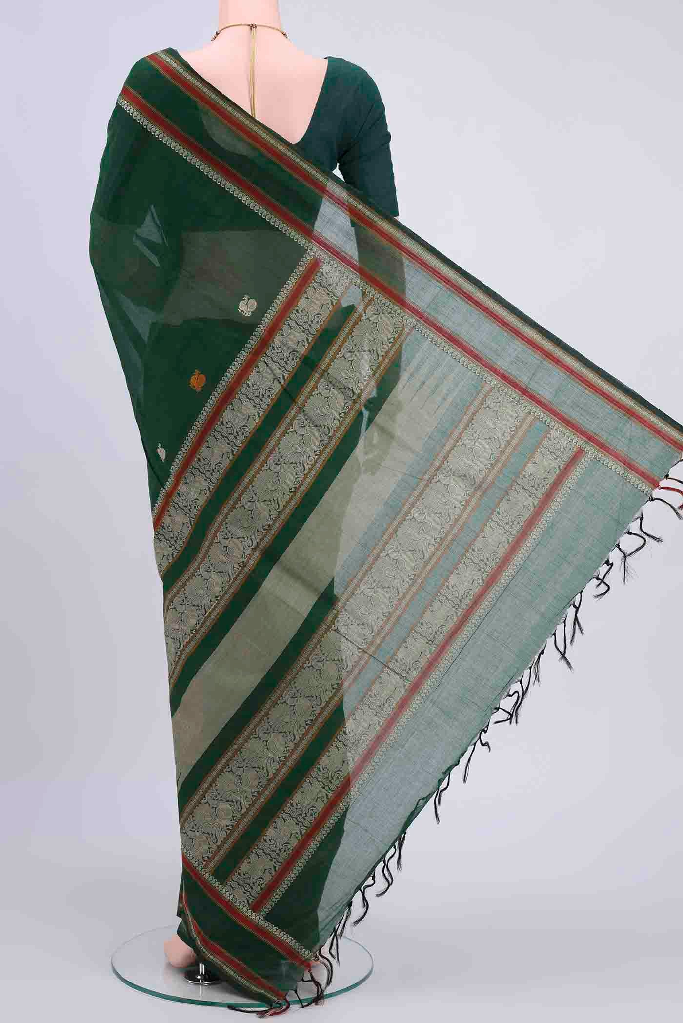 Flat view of Bottle Green Kanchi Cotton Saree with Thread Butta on the body and Thread Border
