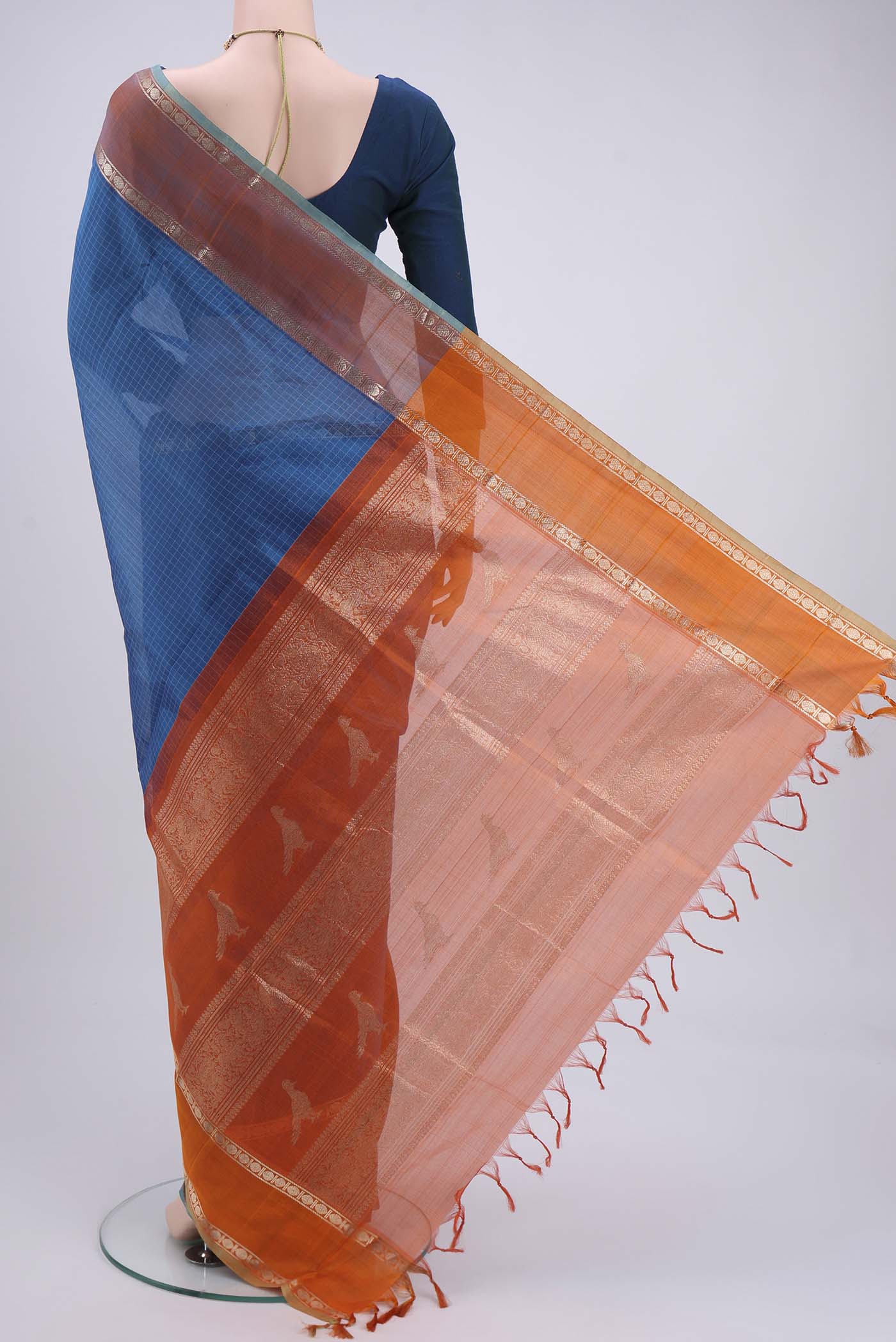 Flat view of Blue Dual Tone Blended Coimbatore Silk Cotton Saree with Checked design on the body and Zari Border. 