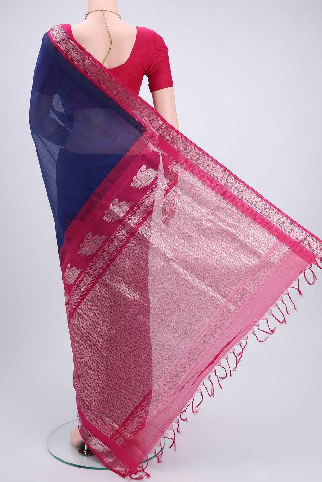 Flat view of Dark Blue Blended Coimbatore Silk Cotton Saree with Plain Body and Zari Border. 