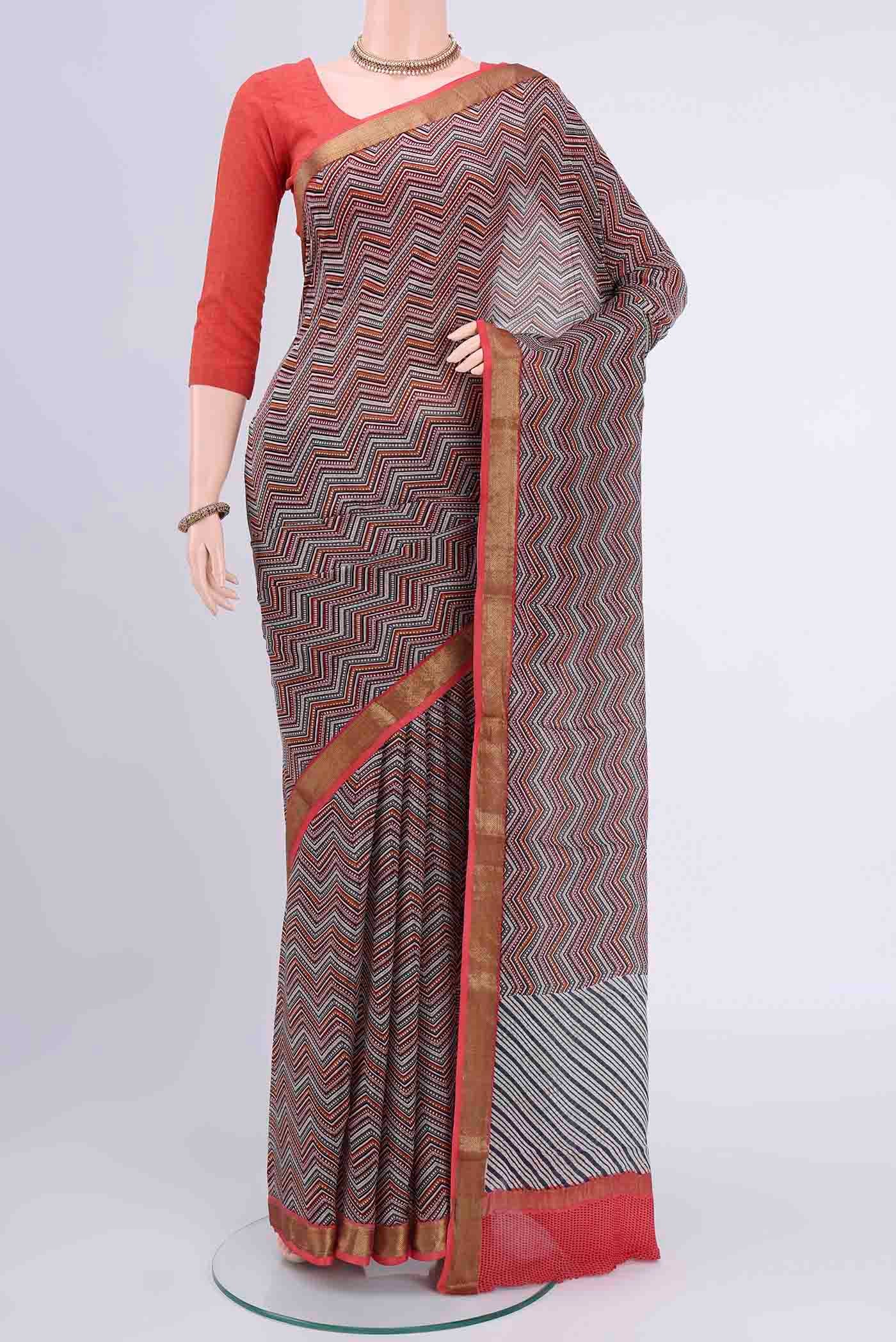 Multi Color Mysore Crepe Saree with Floral Print on the body and Printed Border displayed on a mannequin