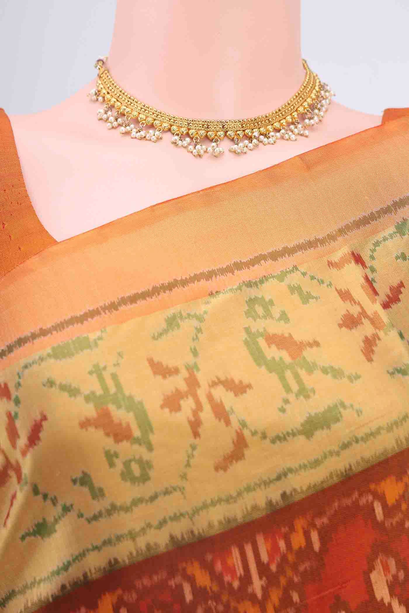 Border image of Rust Rajkot Patola Silk Saree with Pure Ikat on the body and Zari Border