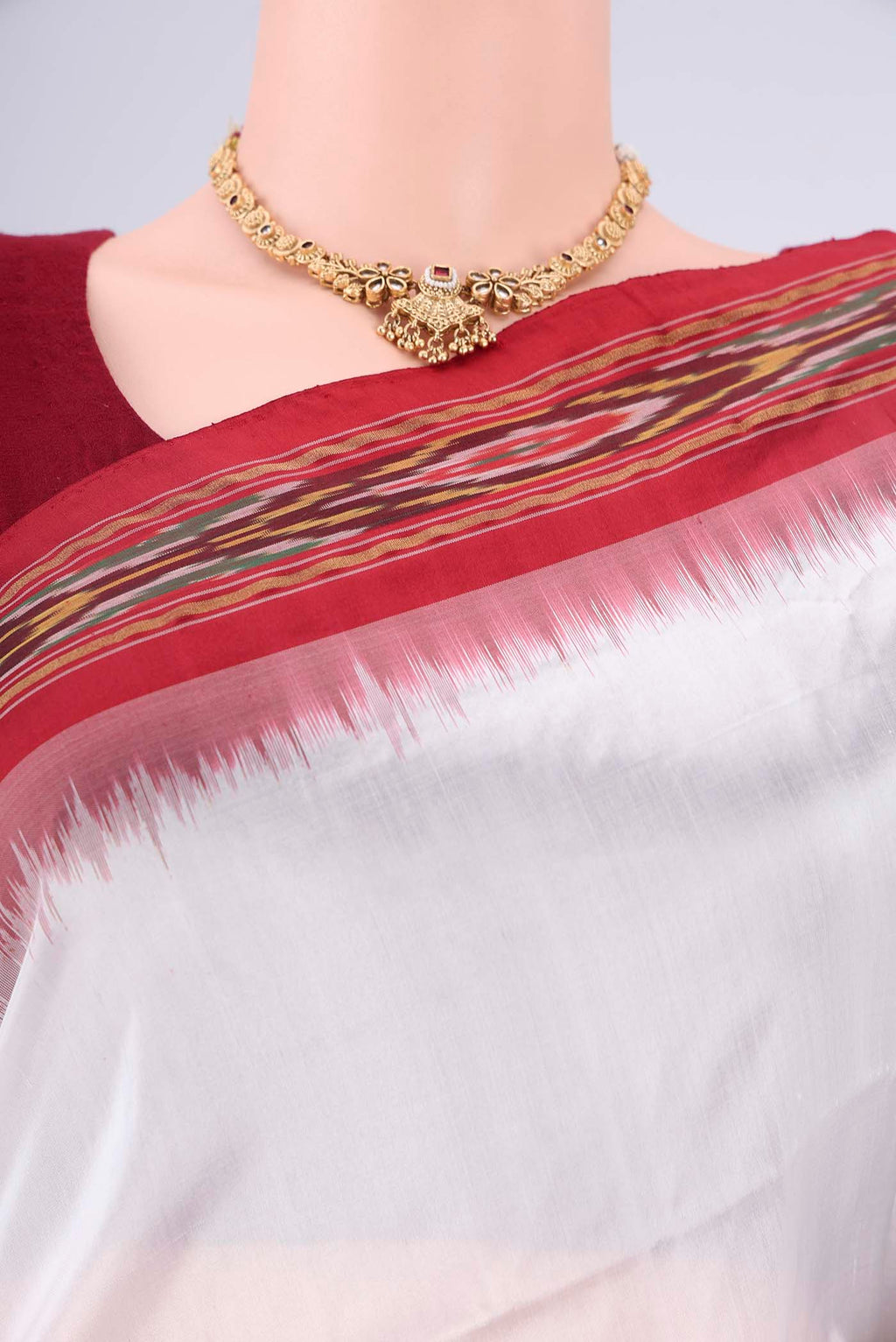 Border image of Off White Pochampally Silk Saree with Plain Body and Ikat Border. 