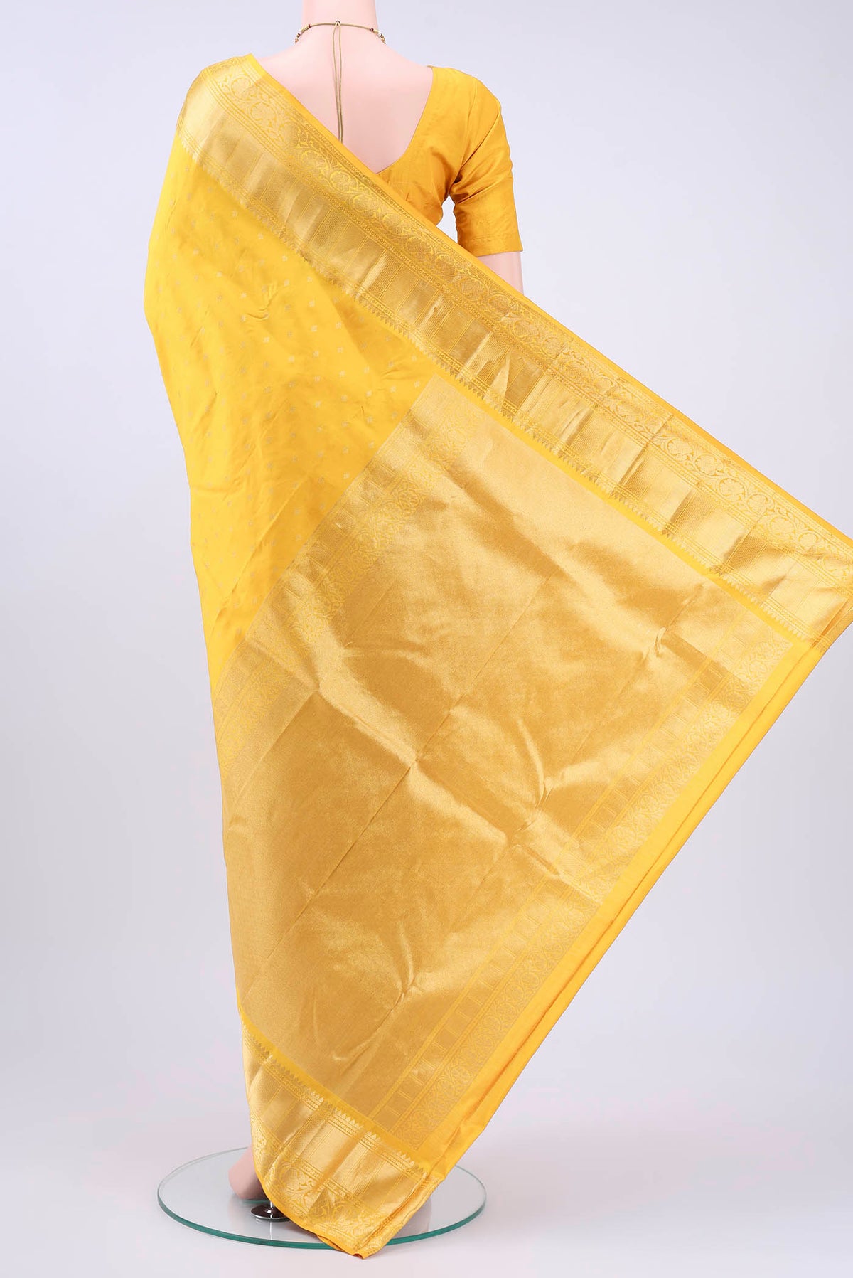 Flat view of Lemon Yellow Nangavalli Silk [ Salem ] Saree with Zari Butta on the body and Zari Border