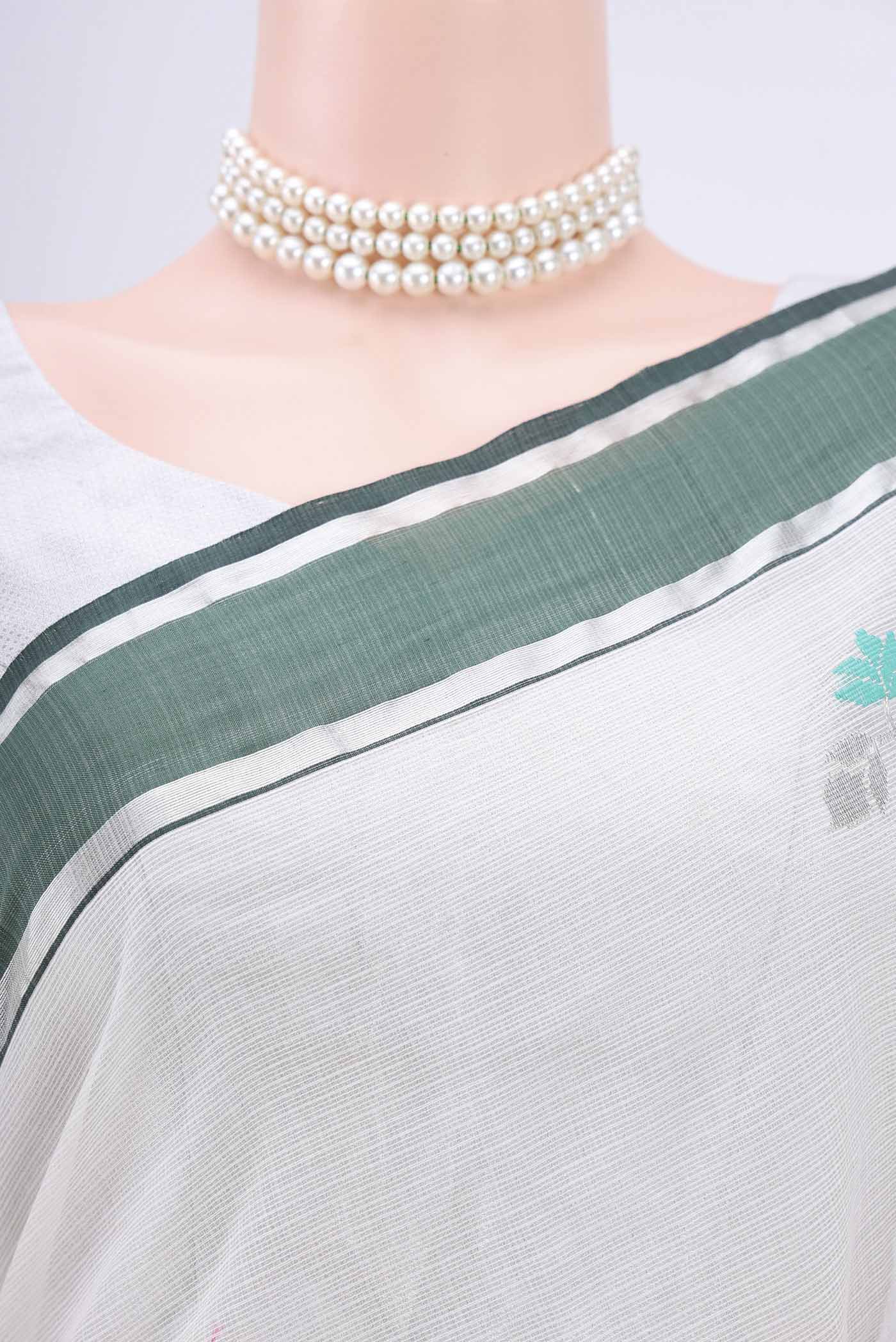 Border image of Pure Silk Pure Zari Off White Kota Cotton Saree with Zari And Thread Butta on the body and Zari Border. 