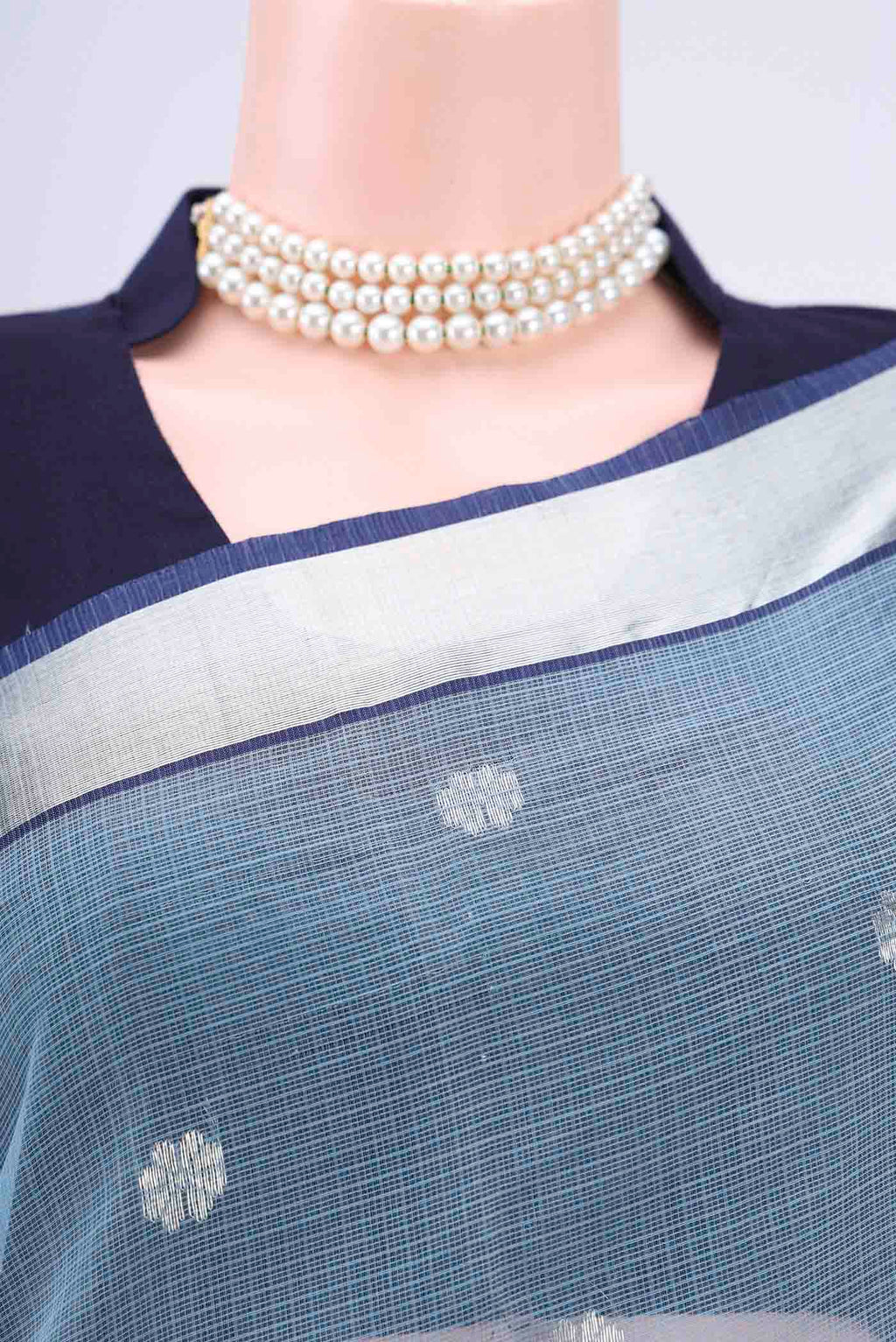 Border image of Pure Silk Pure Zari Light Blue Kota Cotton Saree with Zari And Thread Butta on the body and Zari Border. 