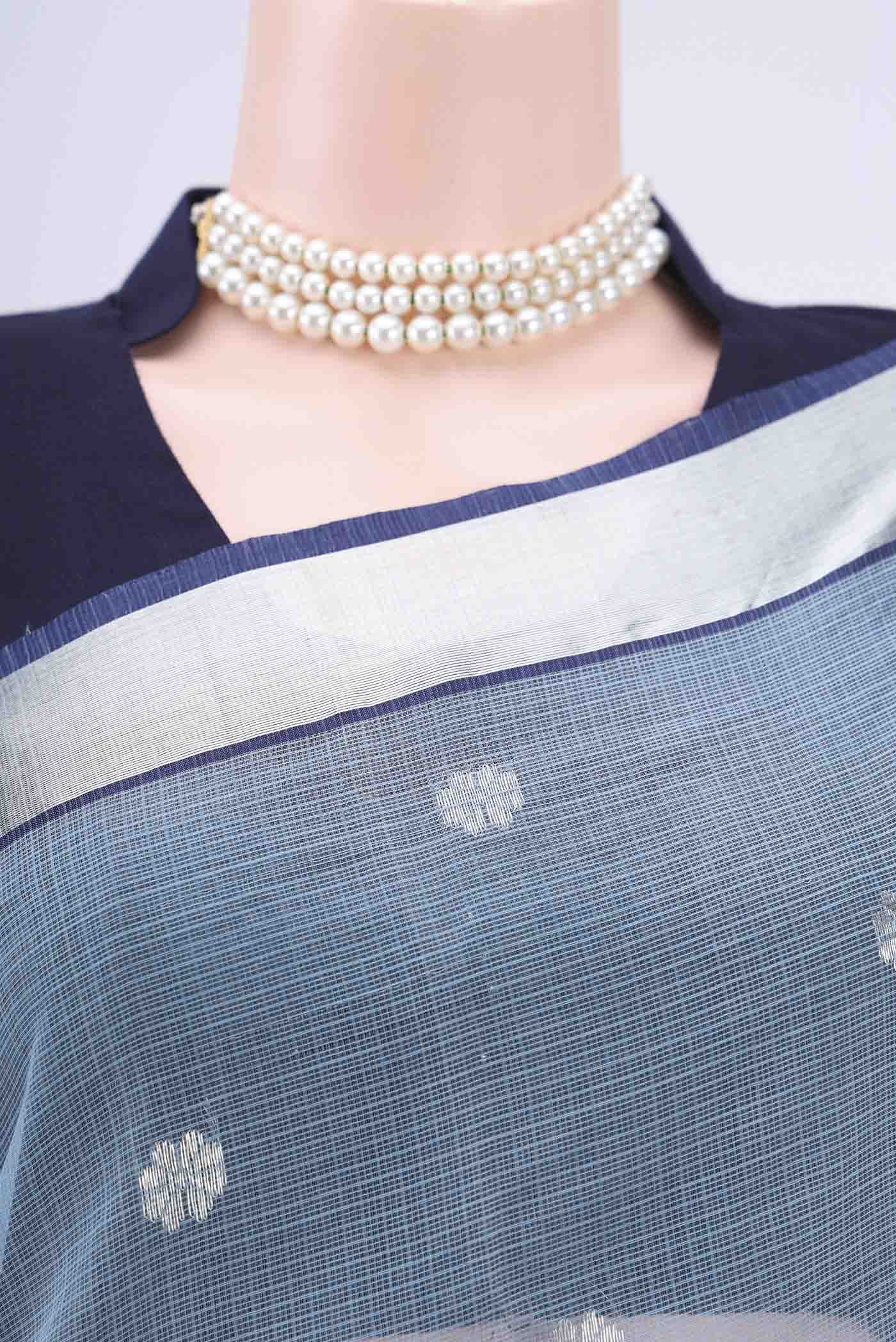 Border image of Pure Silk Pure Zari Light Blue Kota Cotton Saree with Zari And Thread Butta on the body and Zari Border. 