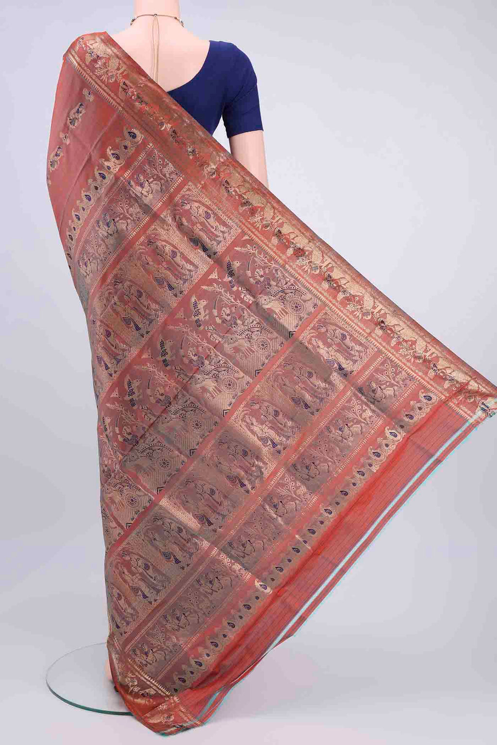 Flat view of Rust Dual Tone Baluchari Silk Saree with Zari And Thread Butta on the body and Zari Border