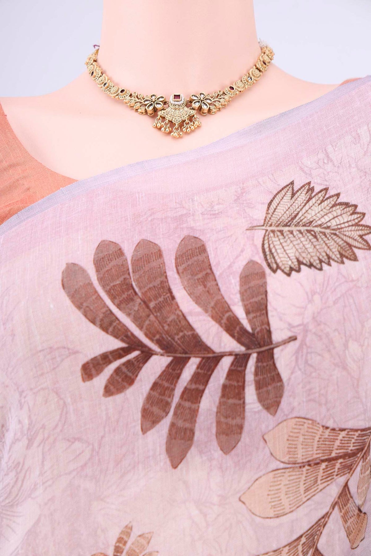 Border image of Lilac Linen Saree with Printed design on the body and Zari Border