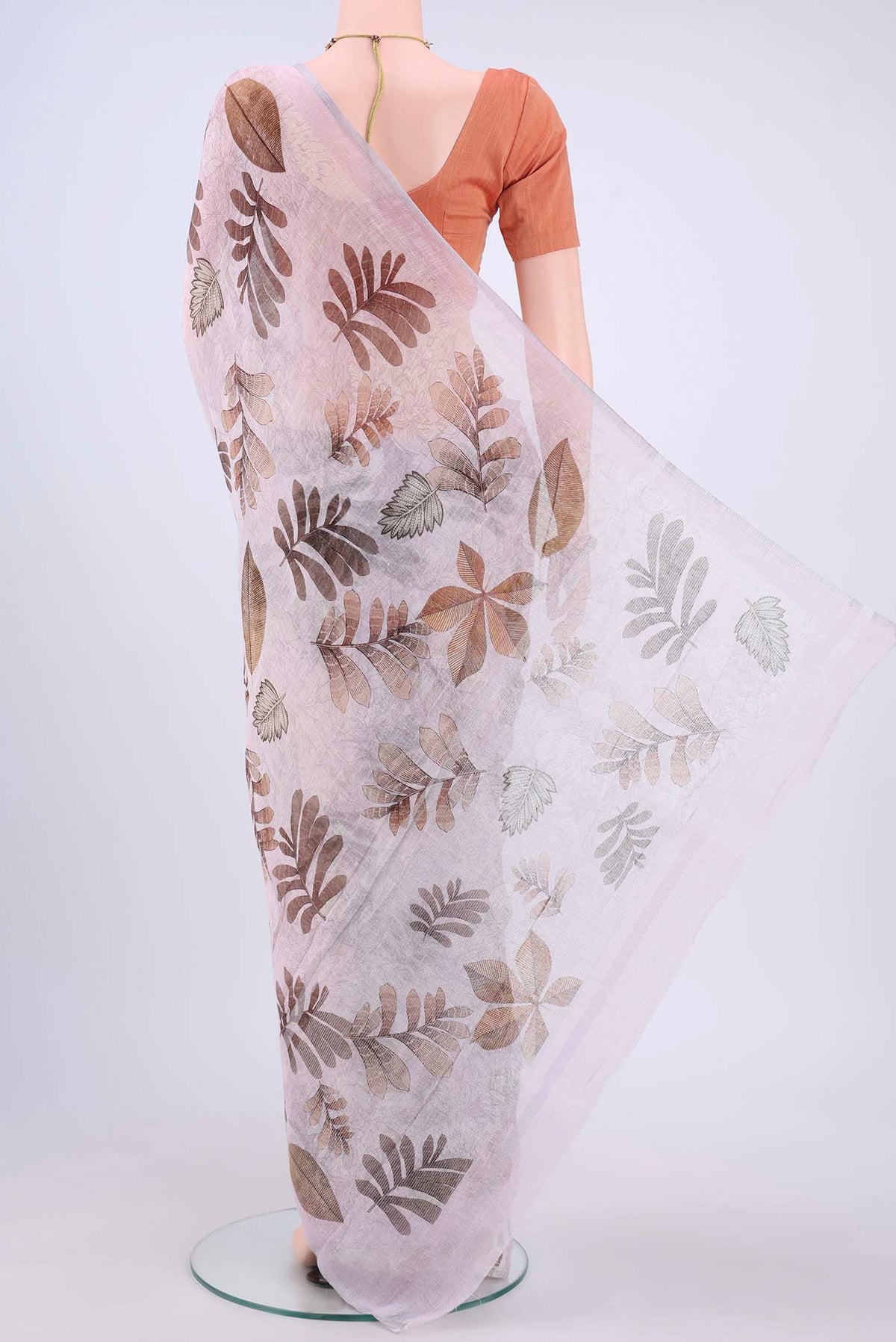 Flat view of Lilac Linen Saree with Printed design on the body and Zari Border