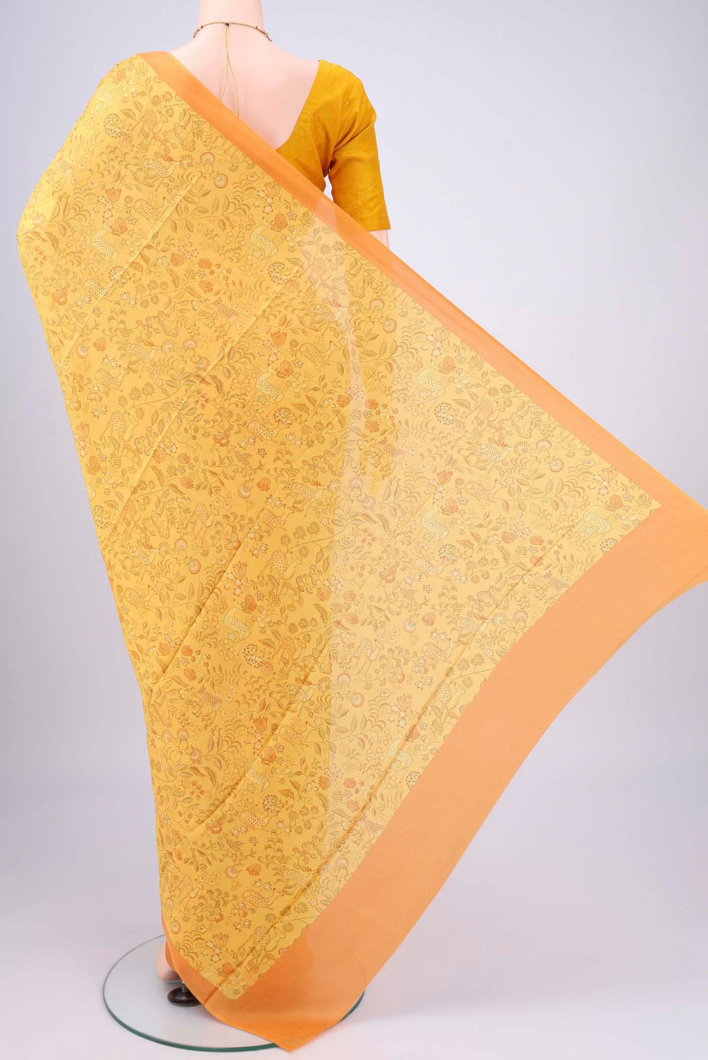 Flat view of Yellow Printed Silk Saree with Floral Print on the body and Printed Border. 