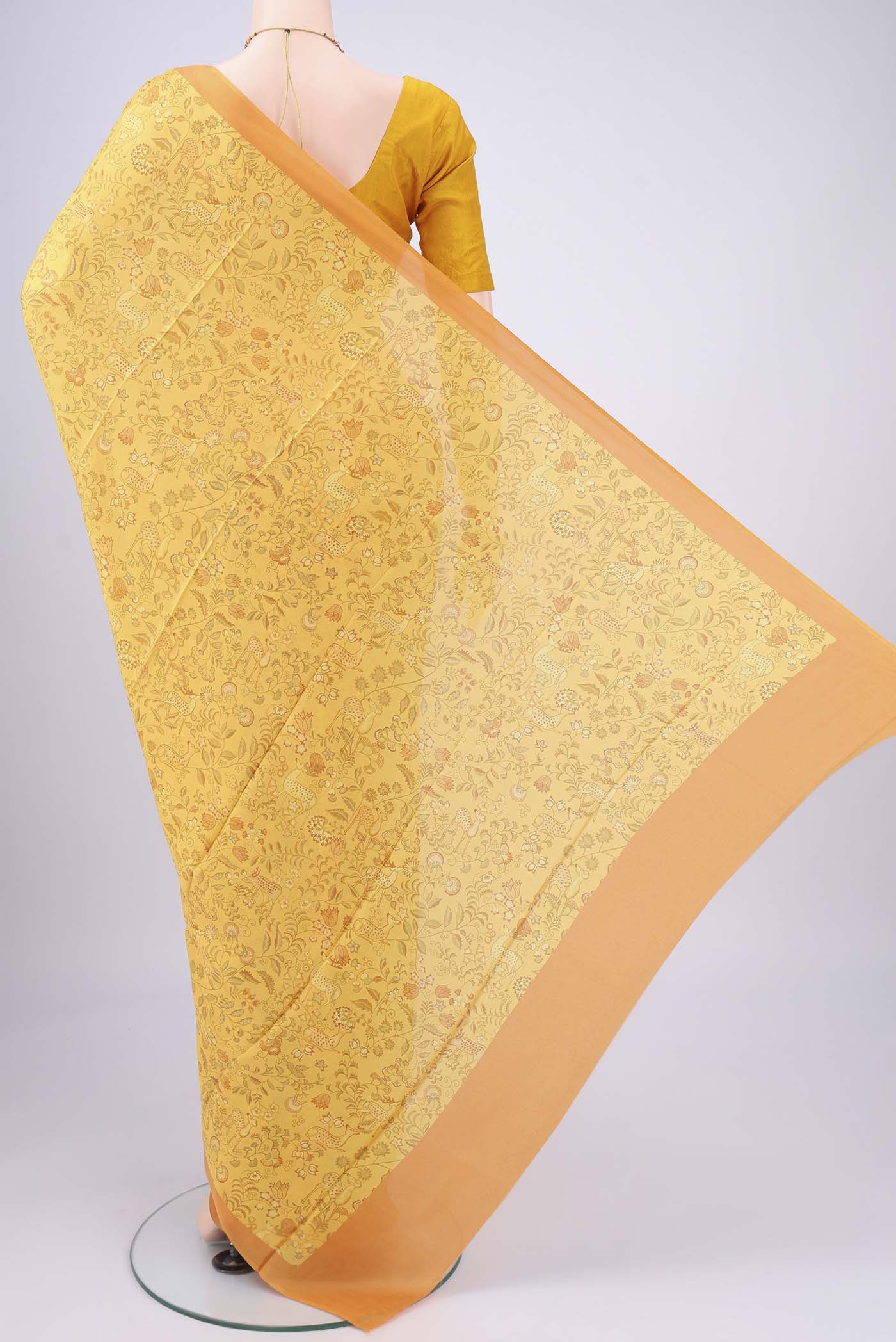 Flat view of Yellow Printed Silk Saree with Floral Print on the body and Printed Border. 