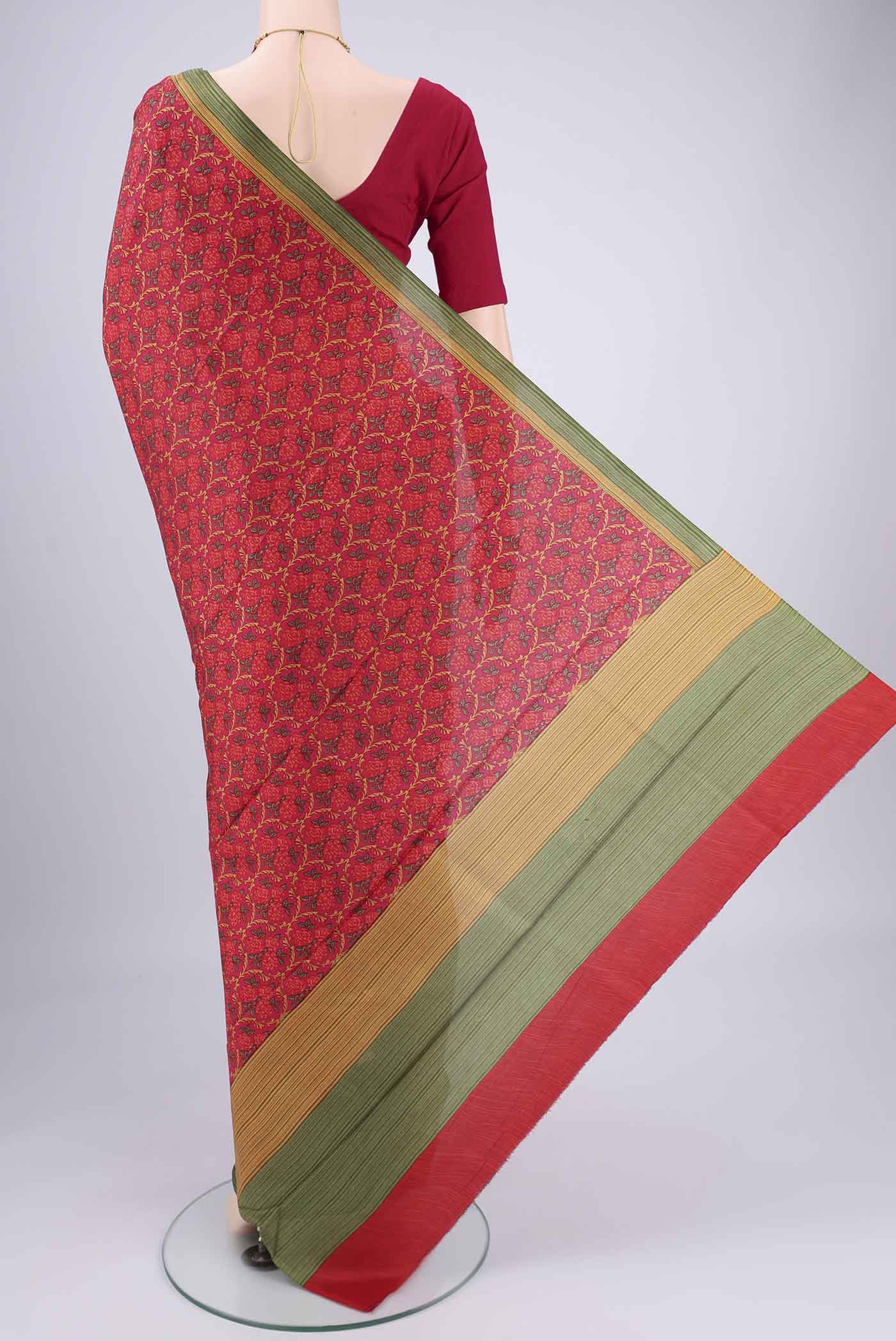 Flat view of Rani Pink Printed Silk Saree with Floral Print on the body and Printed Border. 