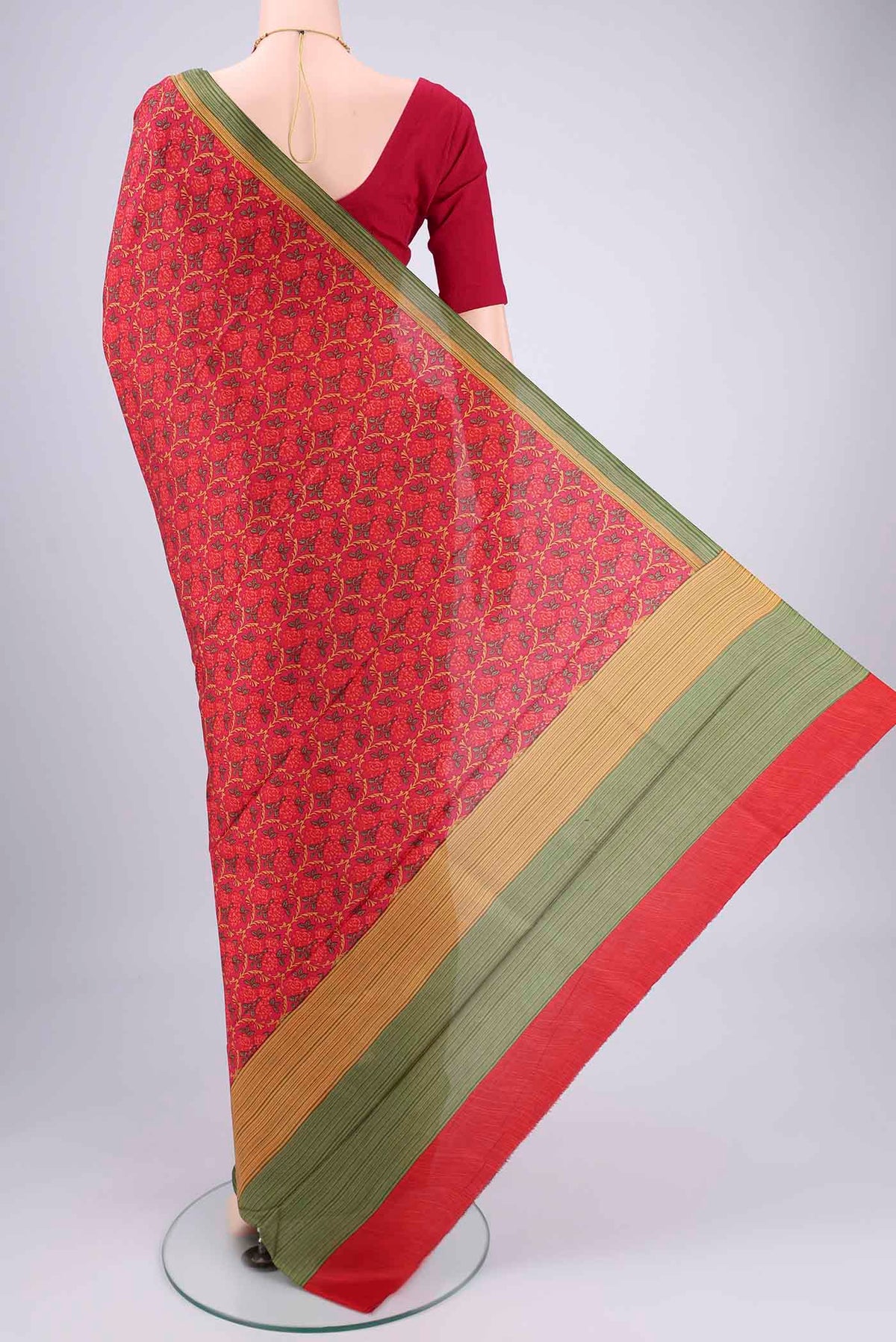 Flat view of Rani Pink Printed Silk Saree with Floral Print on the body and Printed Border. 