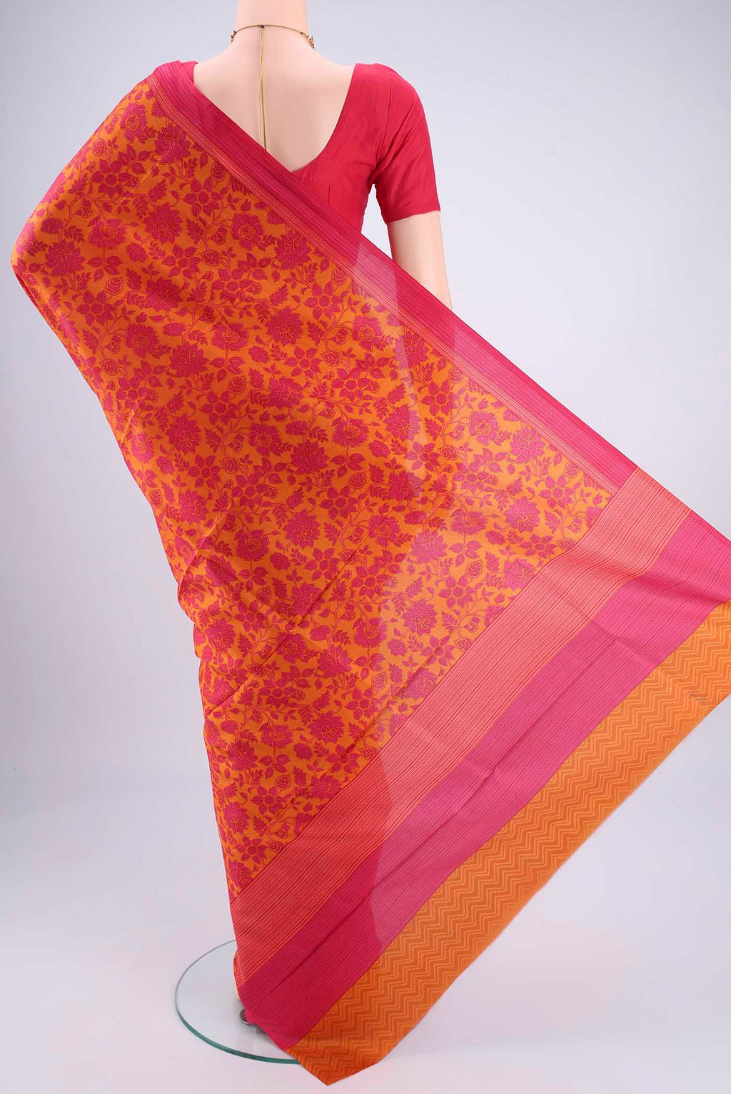 Flat view of Mustard Printed Silk Saree with Floral Print on the body and Printed Border. 