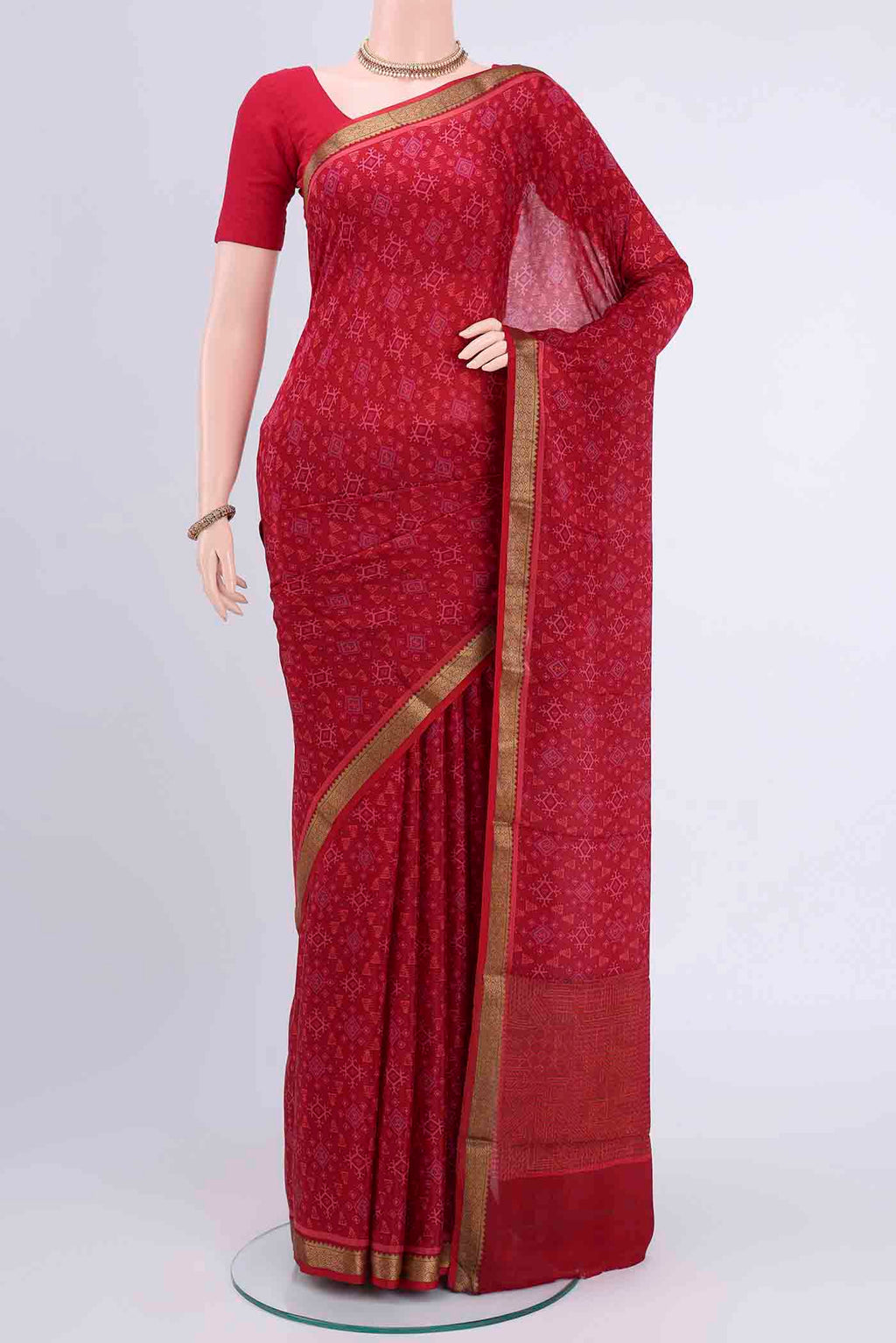 Maroon Mysore Crepe Saree with Floral Print on the body and Printed Border displayed on a mannequin