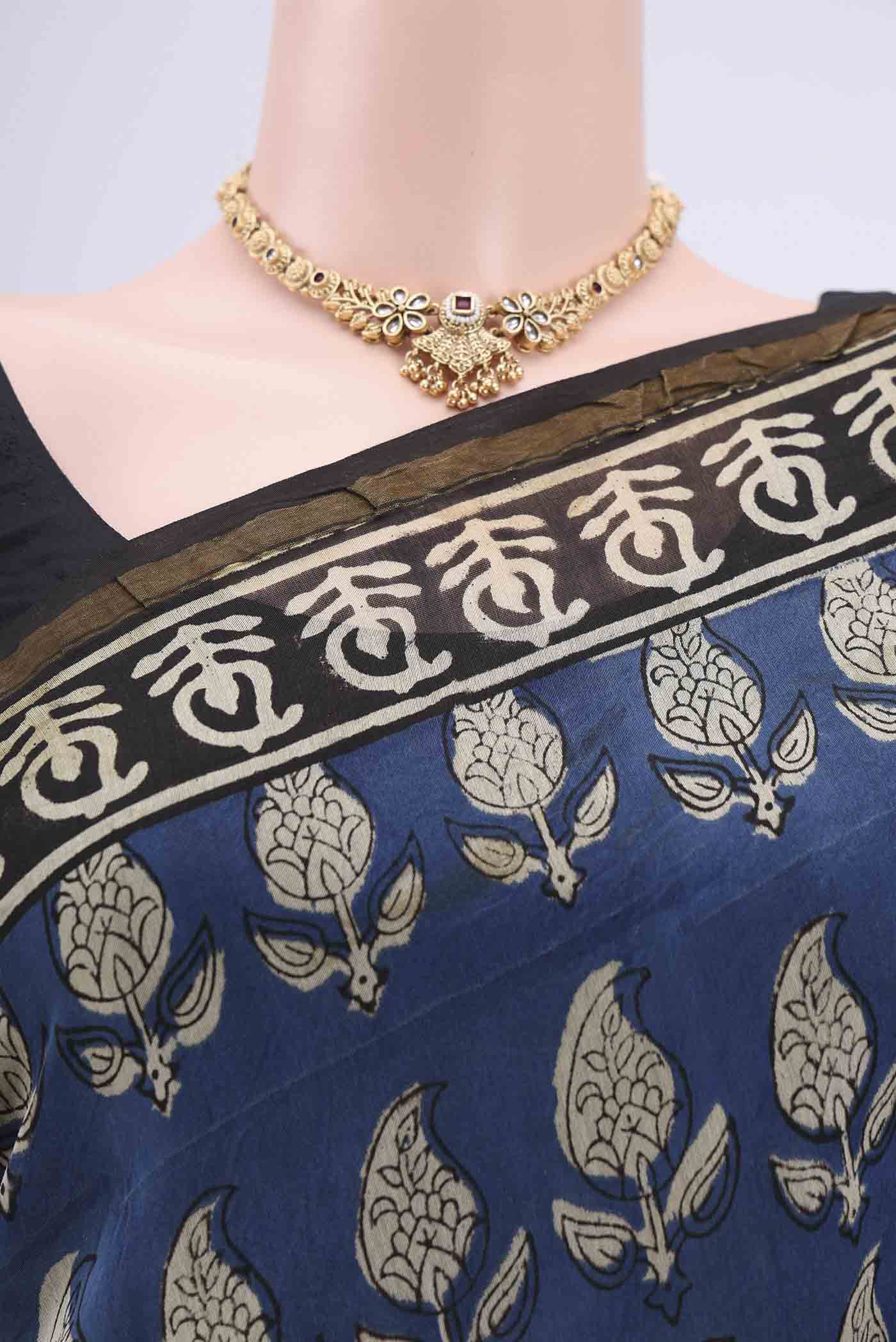 Border image of Blue Chanderi Silk Cotton Saree with Printed design on the body and Zari Border. 