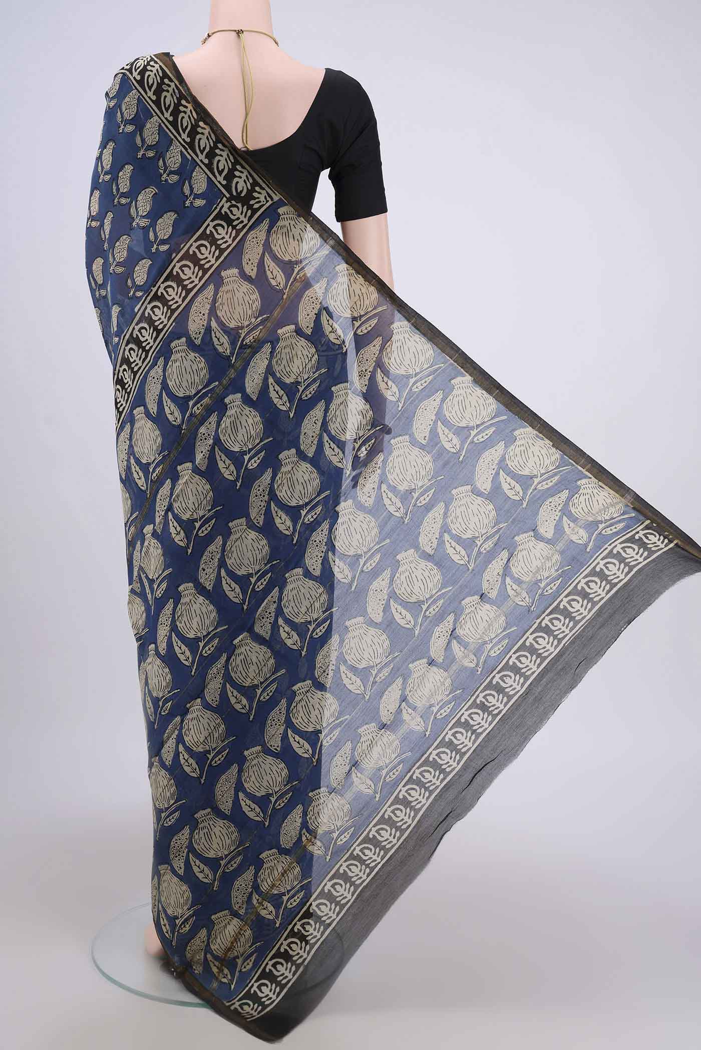Flat view of Blue Chanderi Silk Cotton Saree with Printed design on the body and Zari Border. 