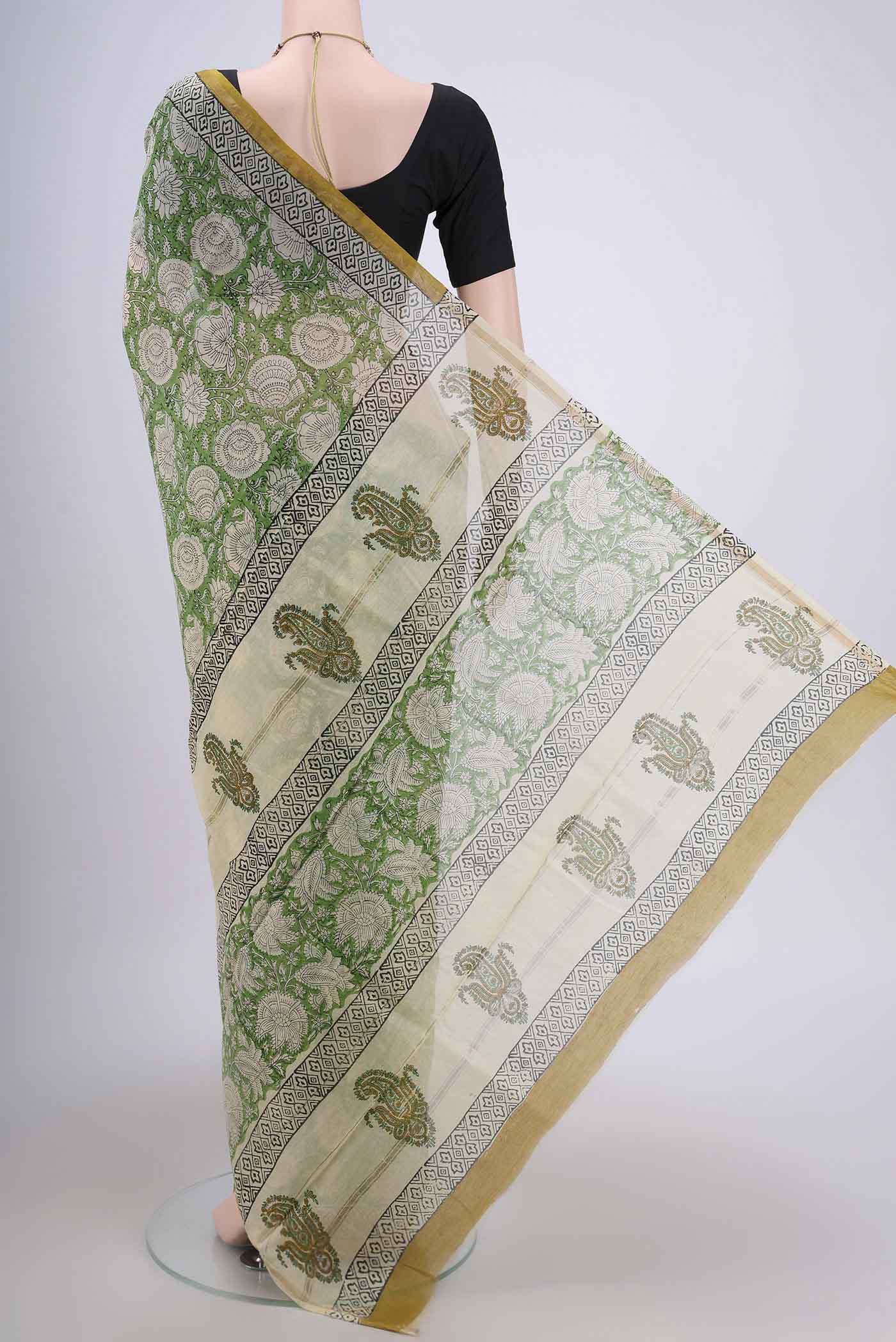 Flat view of Light Green Chanderi Silk Cotton Saree with Printed design on the body and Zari Border. 