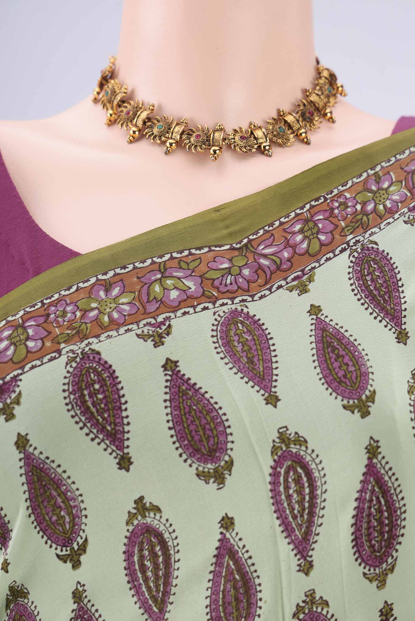 Border image of Mint Green Mysore Crepe Saree with Floral Print on the body and Zari Border. 