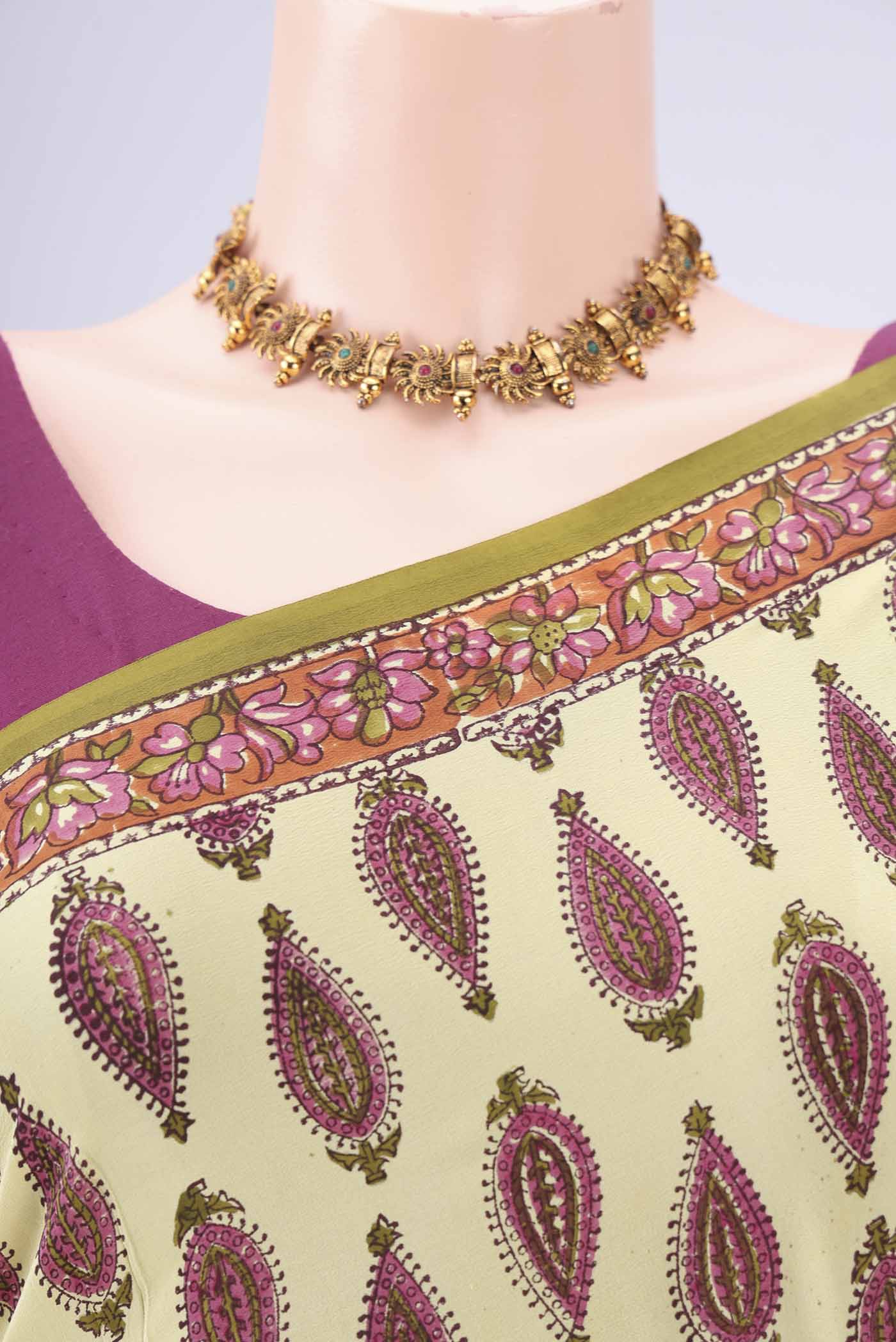 Border image of Lemon Yellow Mysore Crepe Saree with Floral Print on the body and Zari Border. 
