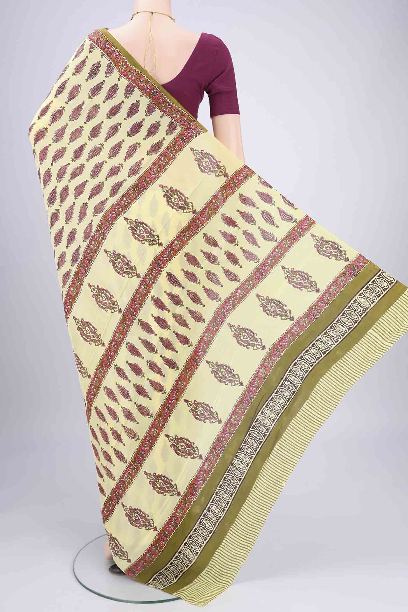 Flat view of Lemon Yellow Mysore Crepe Saree with Floral Print on the body and Zari Border. 