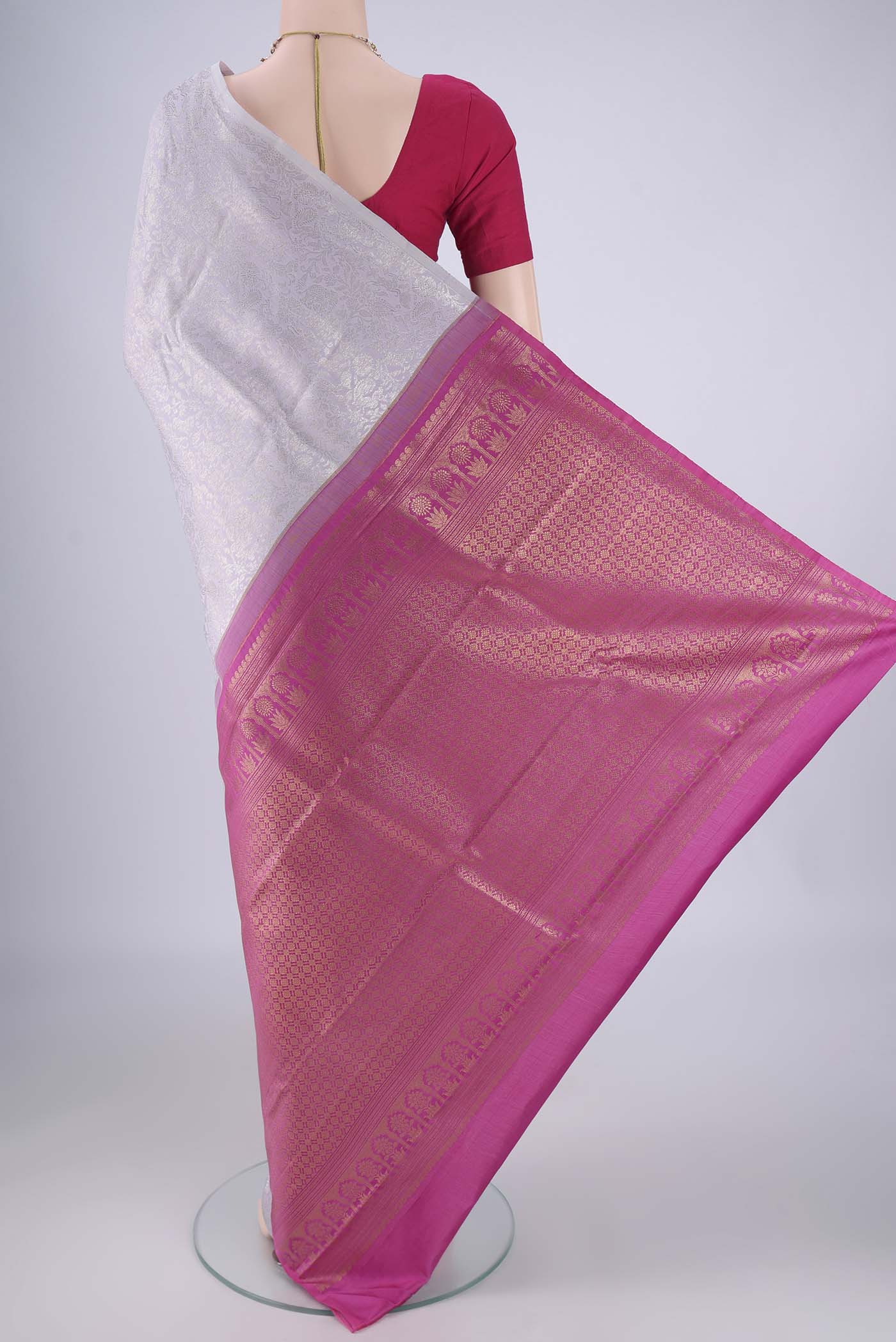 Flat view of Lavender Kanjivaram Silk Saree with Zari Brocade on the body and Without Border. 