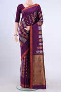 Burgundy Kanchipuram Silk Saree with Zari Brocade on the body and Thread Border displayed on a mannequin