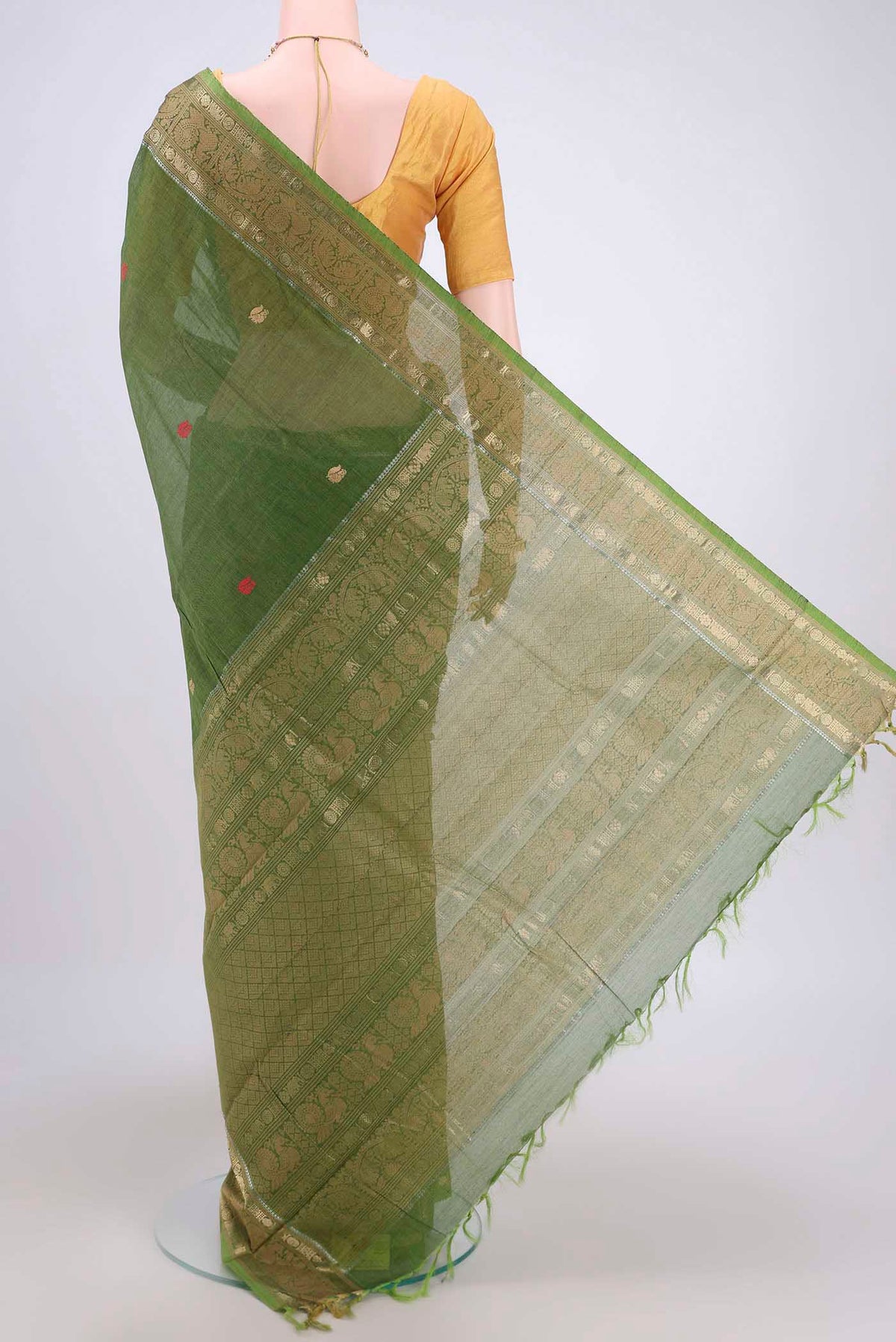Flat view of Green Kanchi Cotton Saree with Plain Body and Zari Border. 