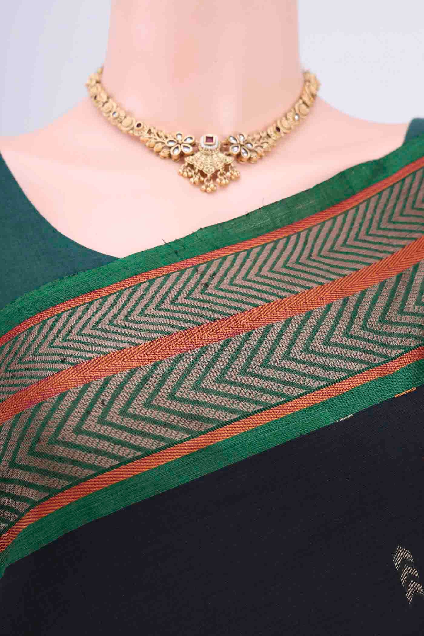 Border image of Black Kanchi Cotton Saree with Thread Butta on the body and Thread Border