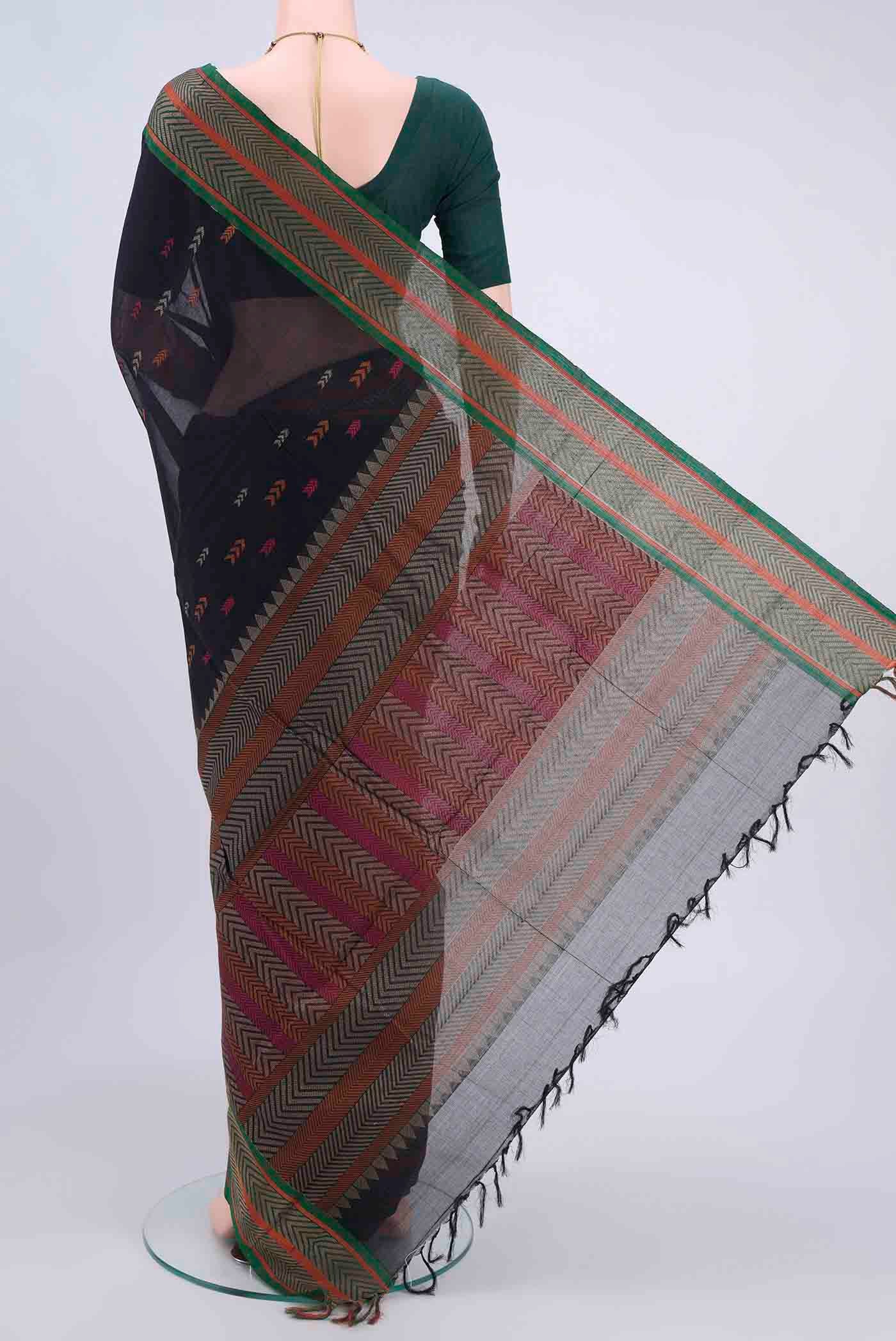 Flat view of Black Kanchi Cotton Saree with Thread Butta on the body and Thread Border
