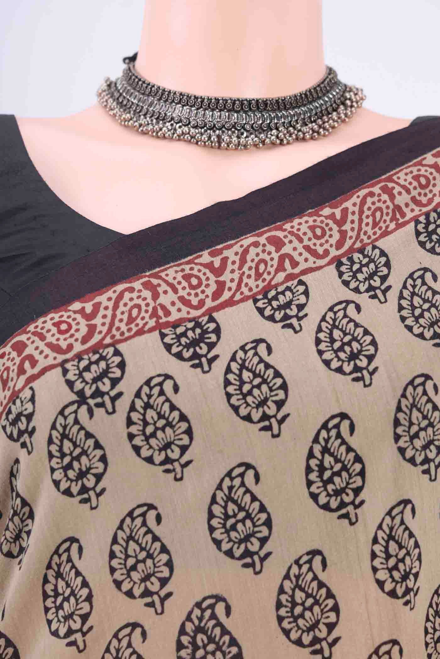Border image of Beige Tussar Silk Saree with Printed design on the body and Printed Border