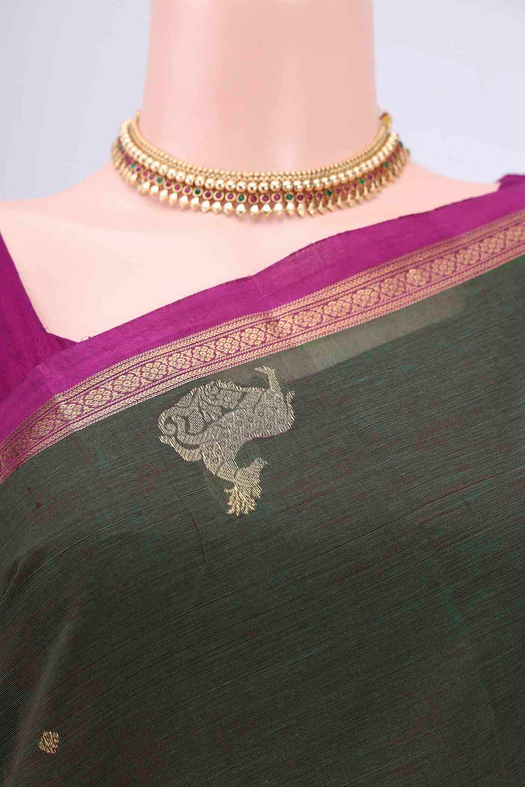 Border image of Green Kanchi Cotton Saree with Zari Butta on the body and Zari Border. 