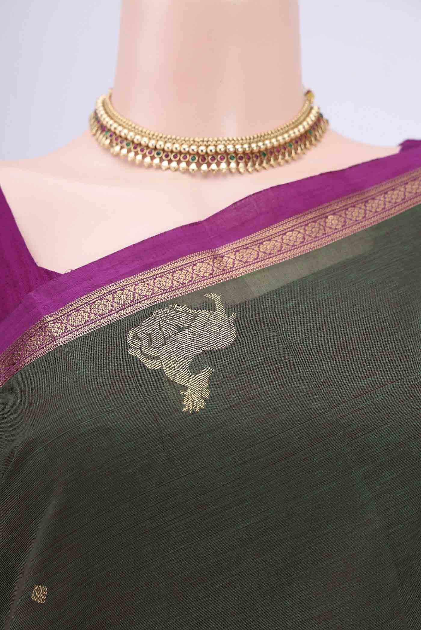 Border image of Green Kanchi Cotton Saree with Zari Butta on the body and Zari Border. 